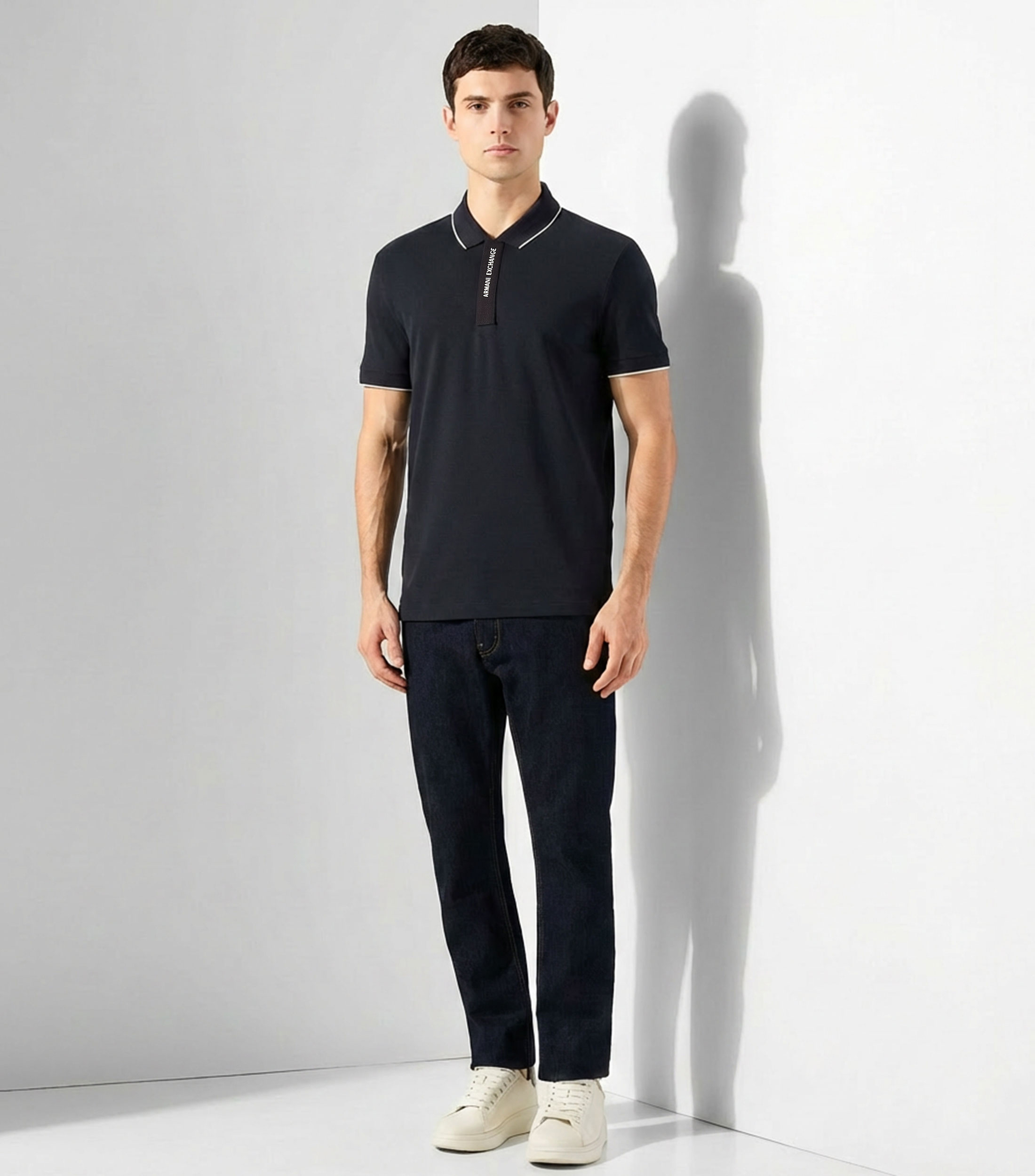 Playera tipo polo con manga corta lisa Hombre