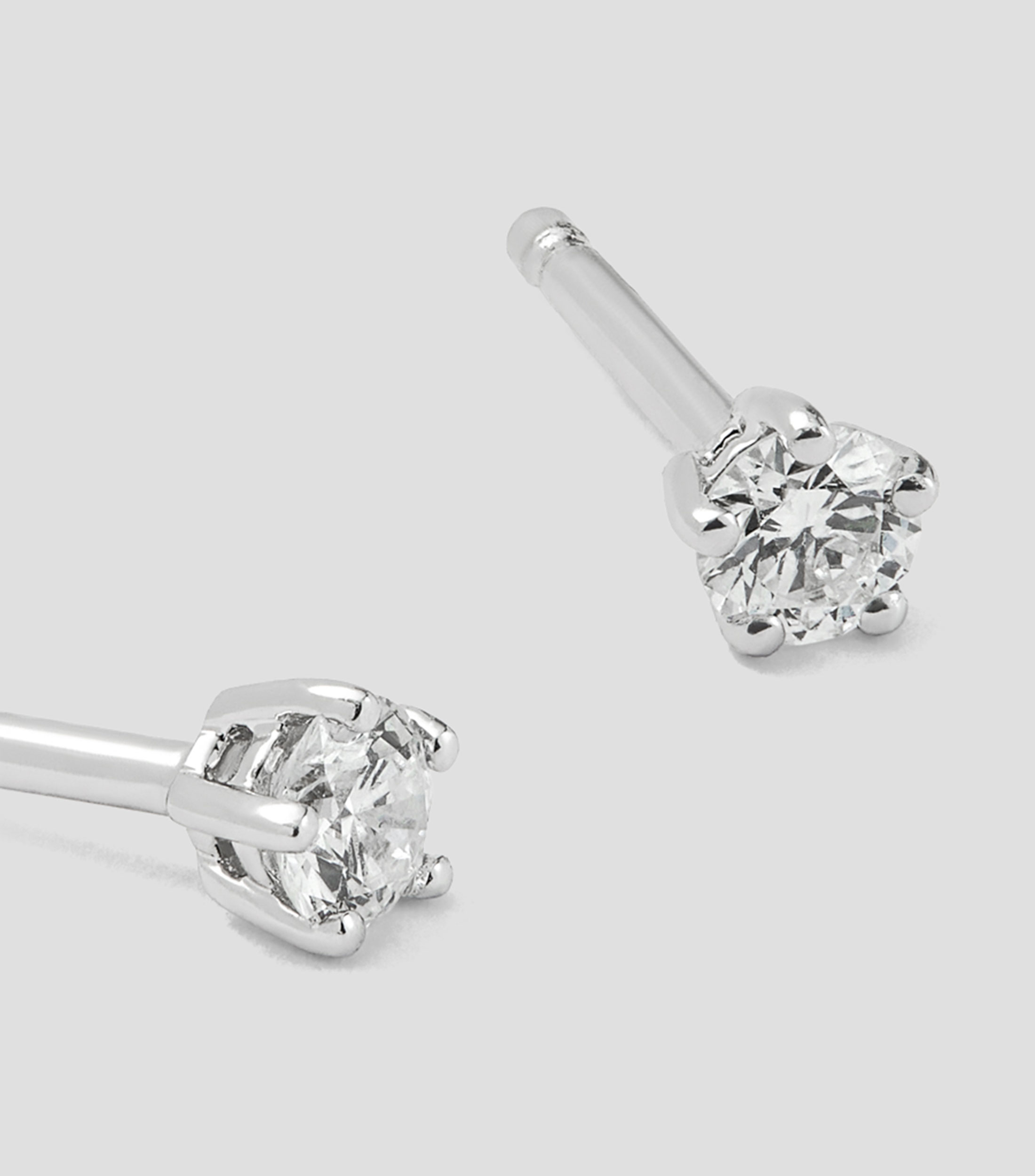 Aretes de oro blanco con diamantes Mujer
