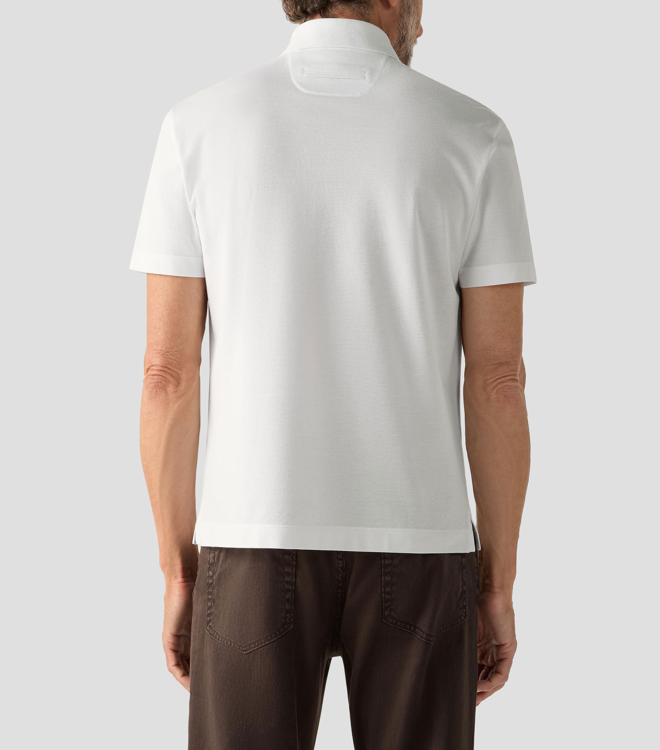Playera tipo polo con manga corta lisa Hombre