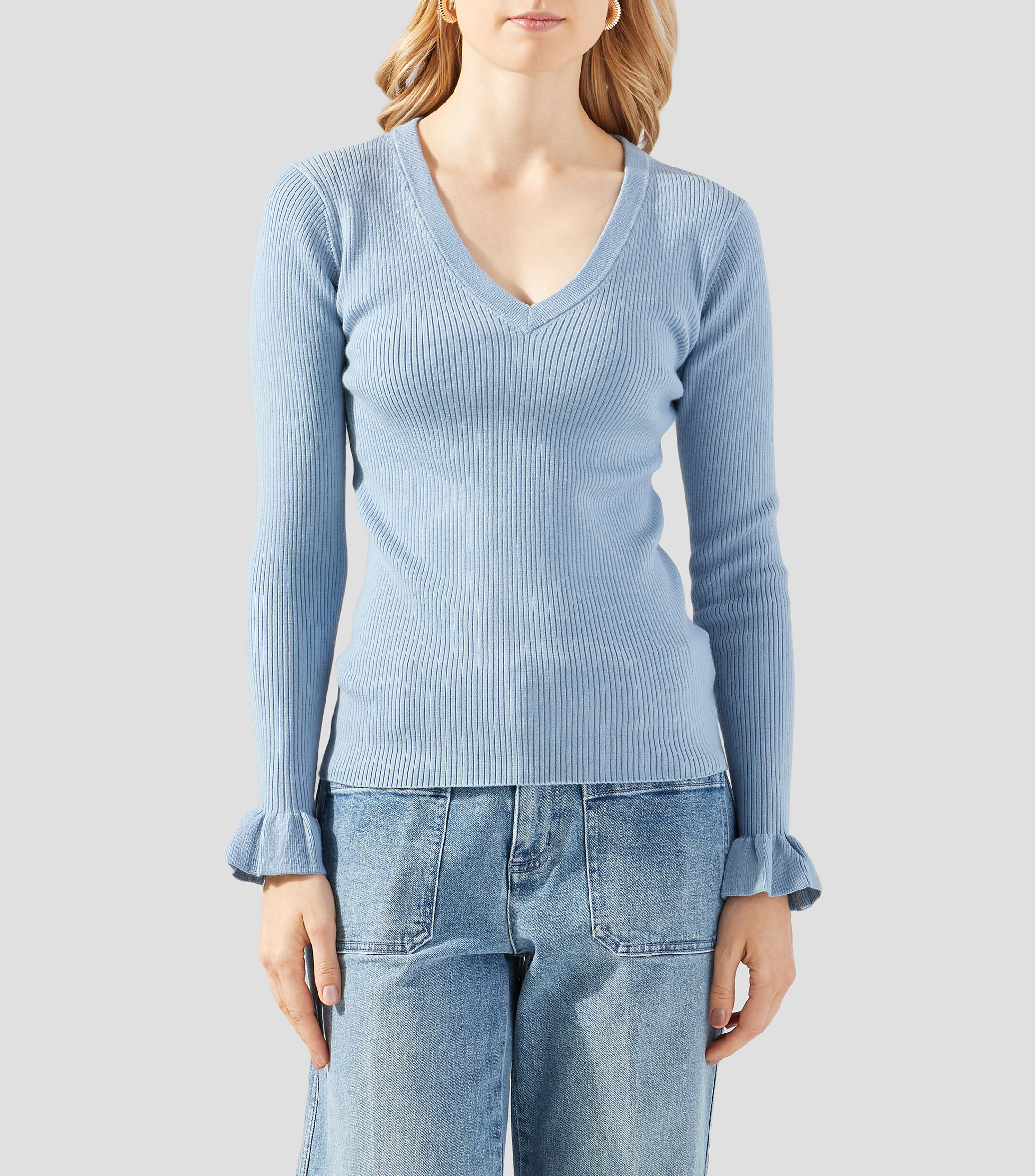 Suéter cuello V Mujer