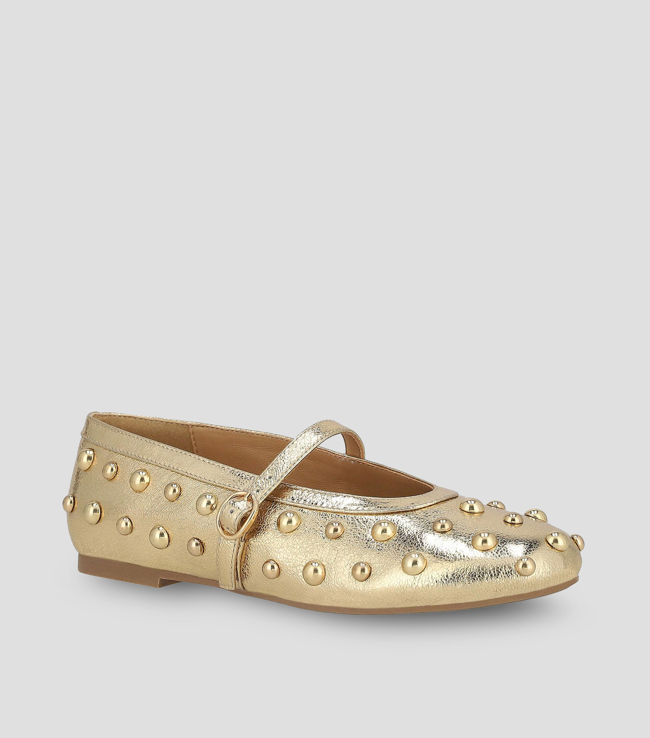 Flats en piel con tacón media luna y estoperol Mujer