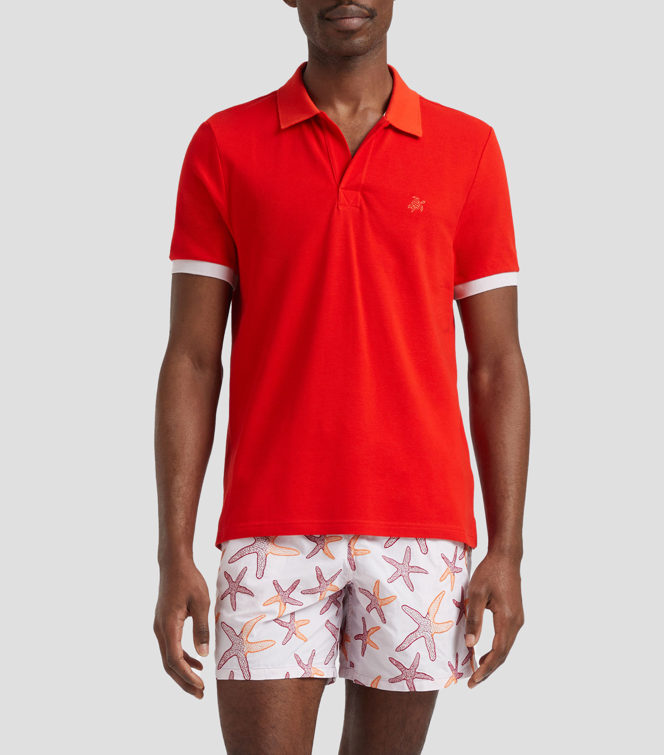 Playera tipo polo con manga corta lisa Hombre