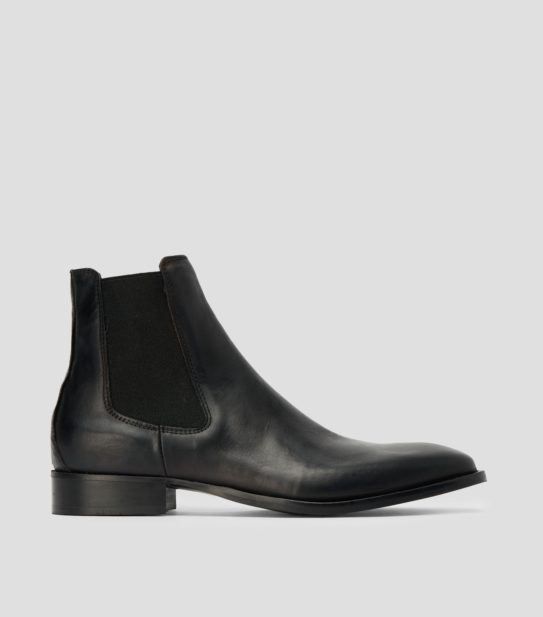Botines en piel Hombre