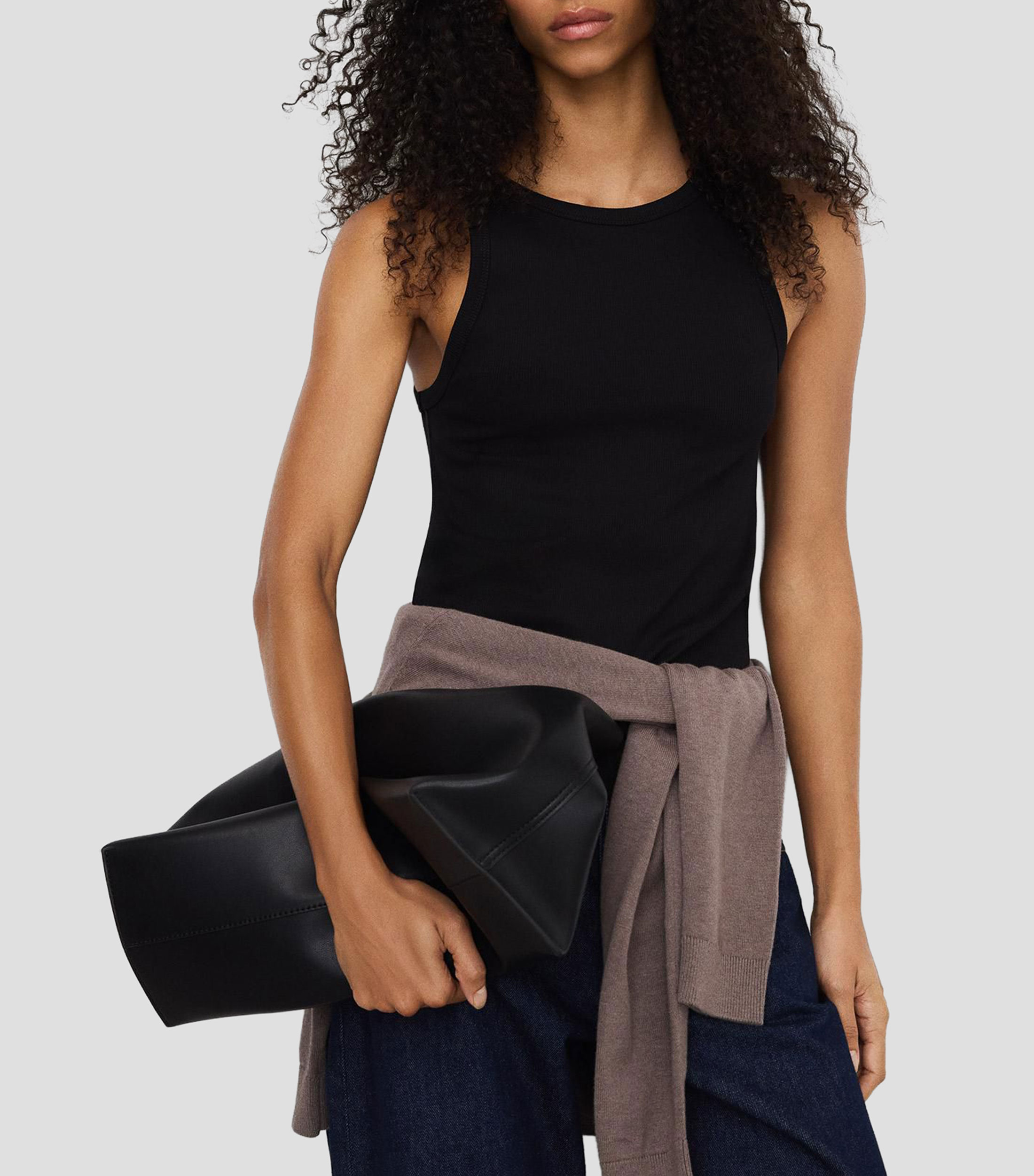 Blusa lisa sin mangas Mujer