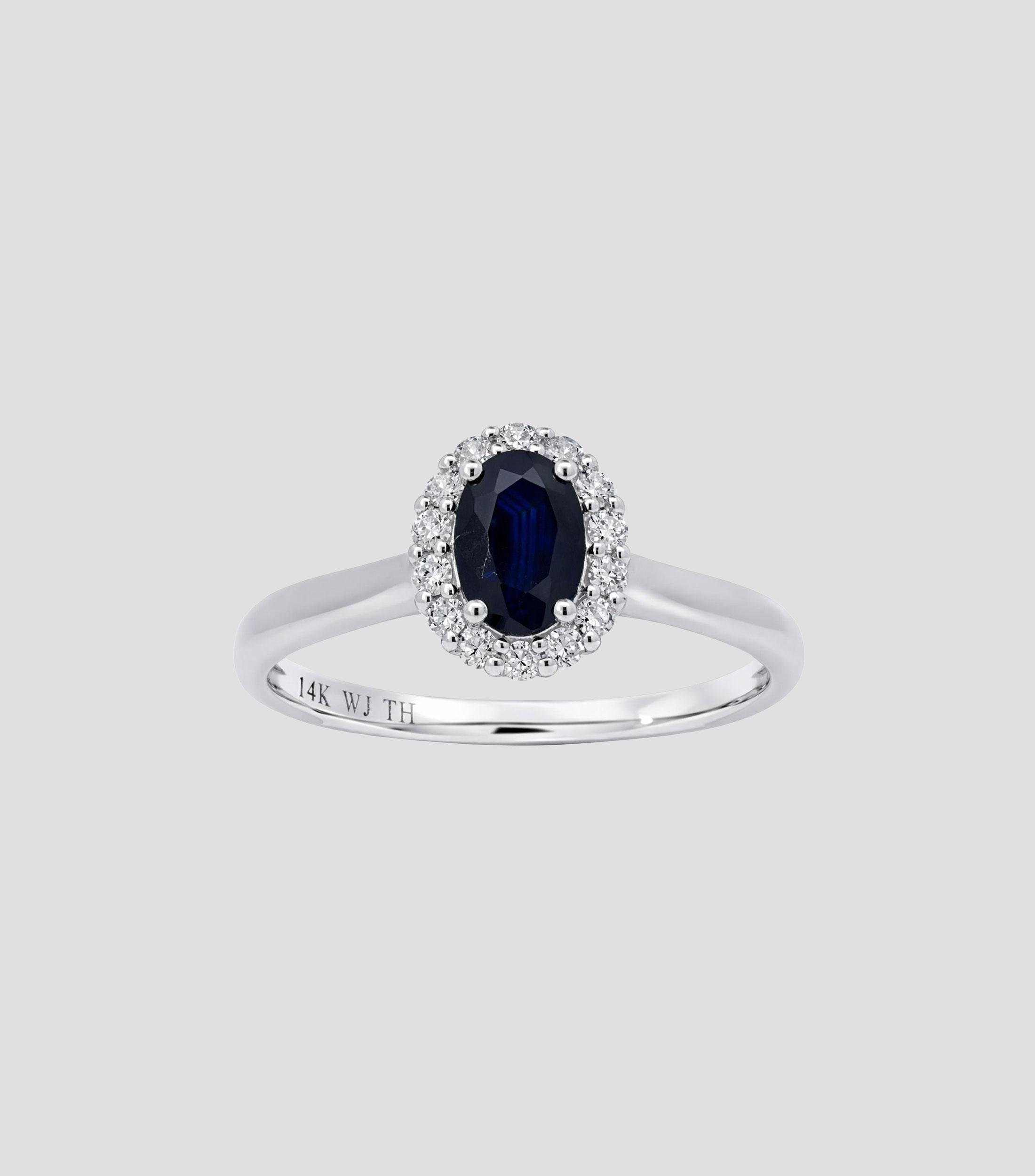 Anillo en Oro blanco de 14 Kilates con zafiro Mujer