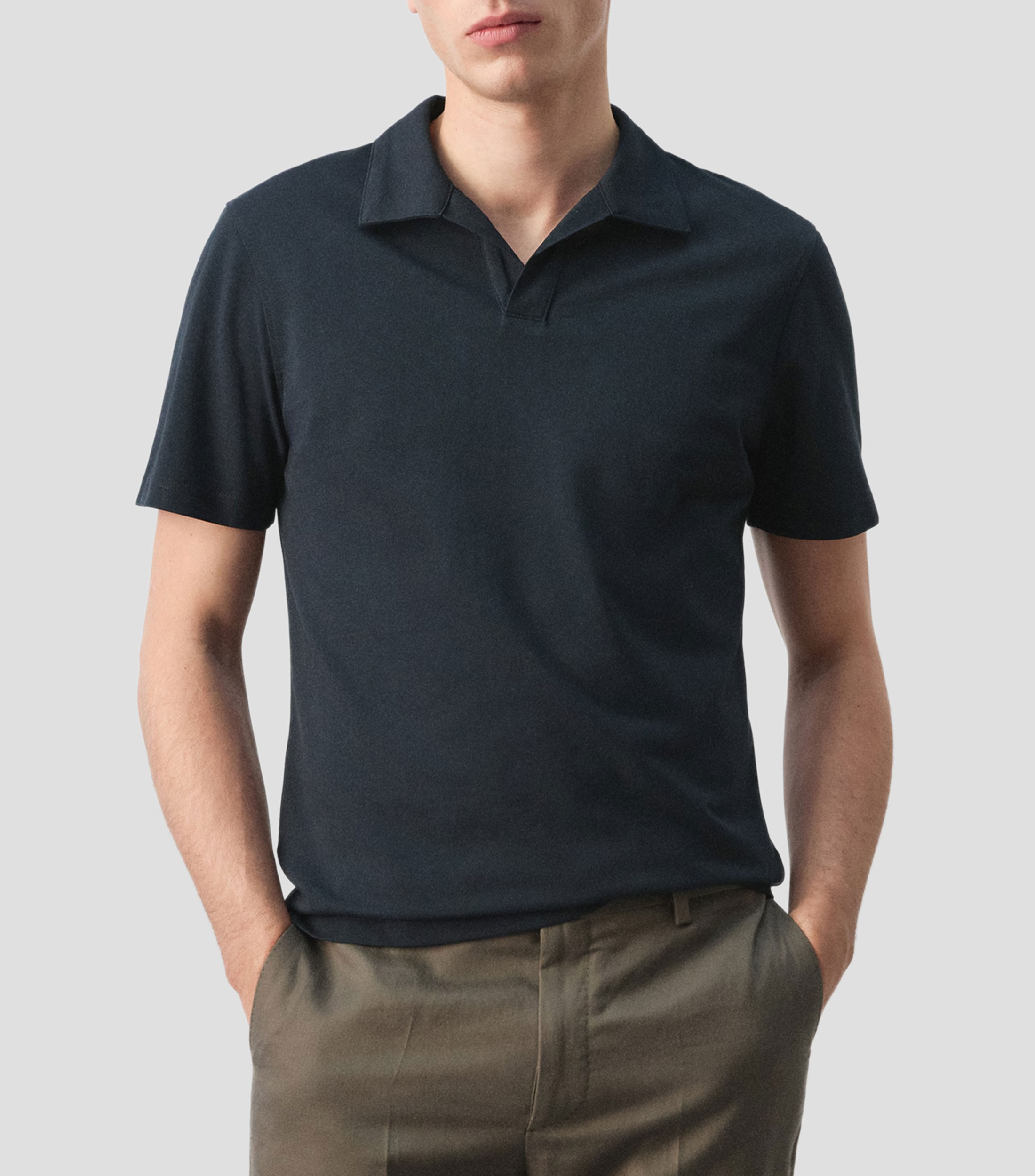 Playera tipo polo de manga corta lisa Hombre