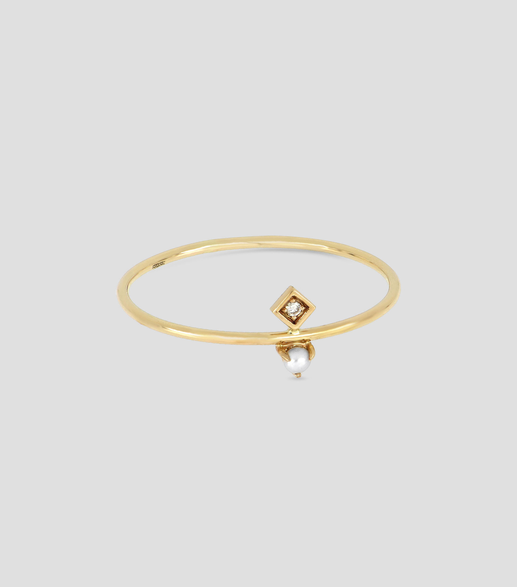 Anillo de oro amarillo 18 Kts con diamante y perla Mujer
