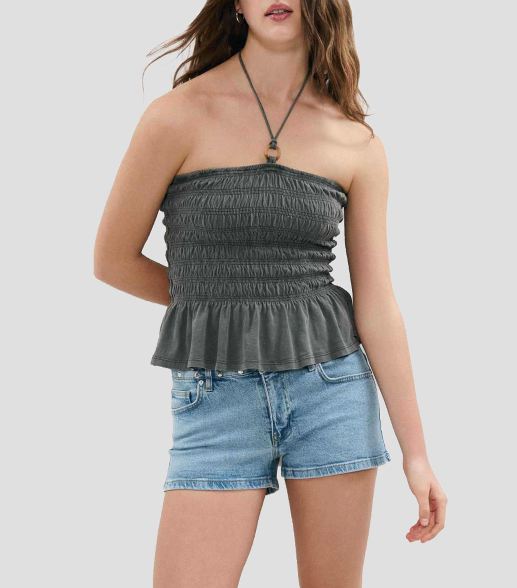 Blusa lisa sin mangas Mujer