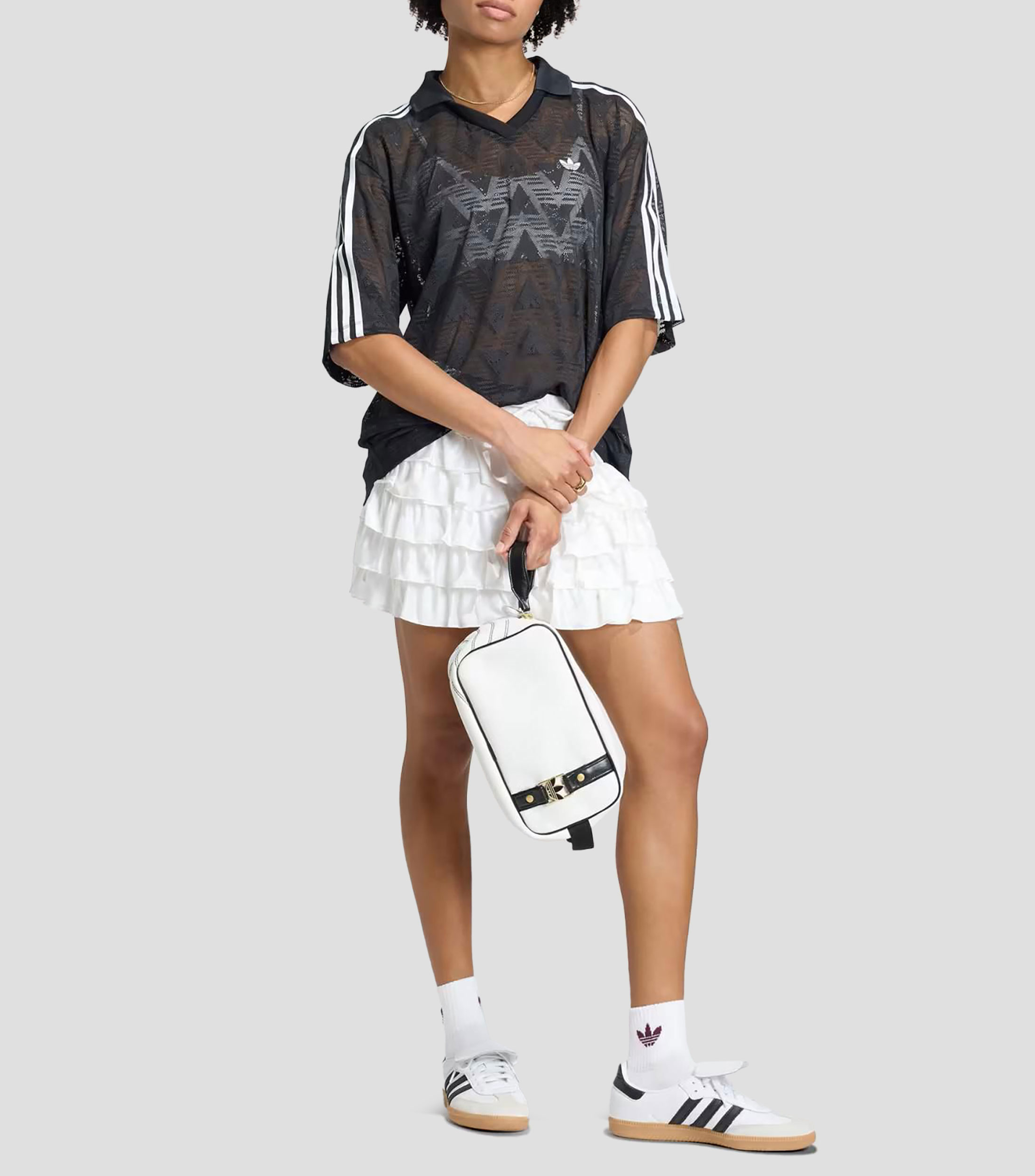 Playera tipo polo con manga corta estampada Mujer
