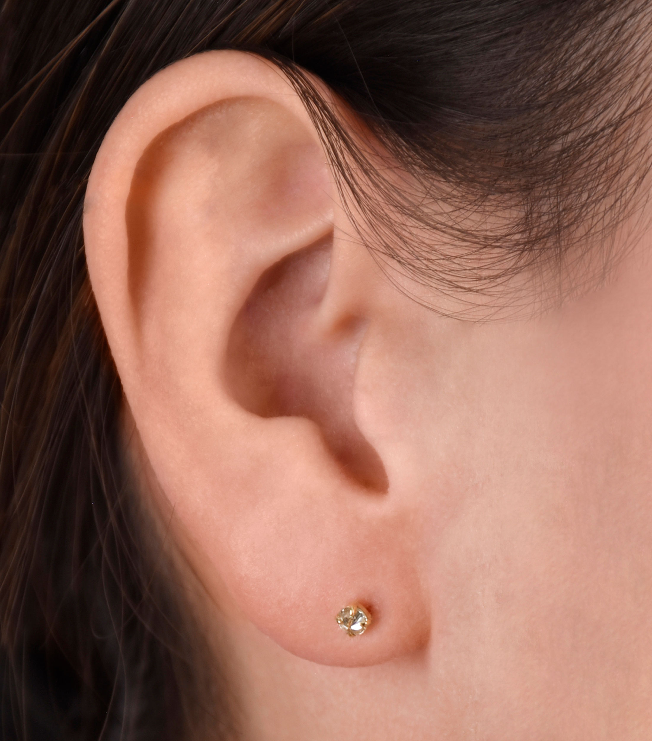 Broqueles en oro amarillo 18 kilates con diamante Mujer
