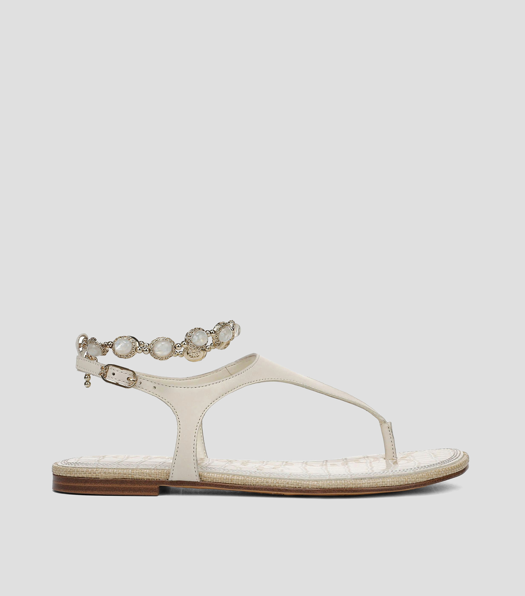 Sandalias planas en piel Mujer