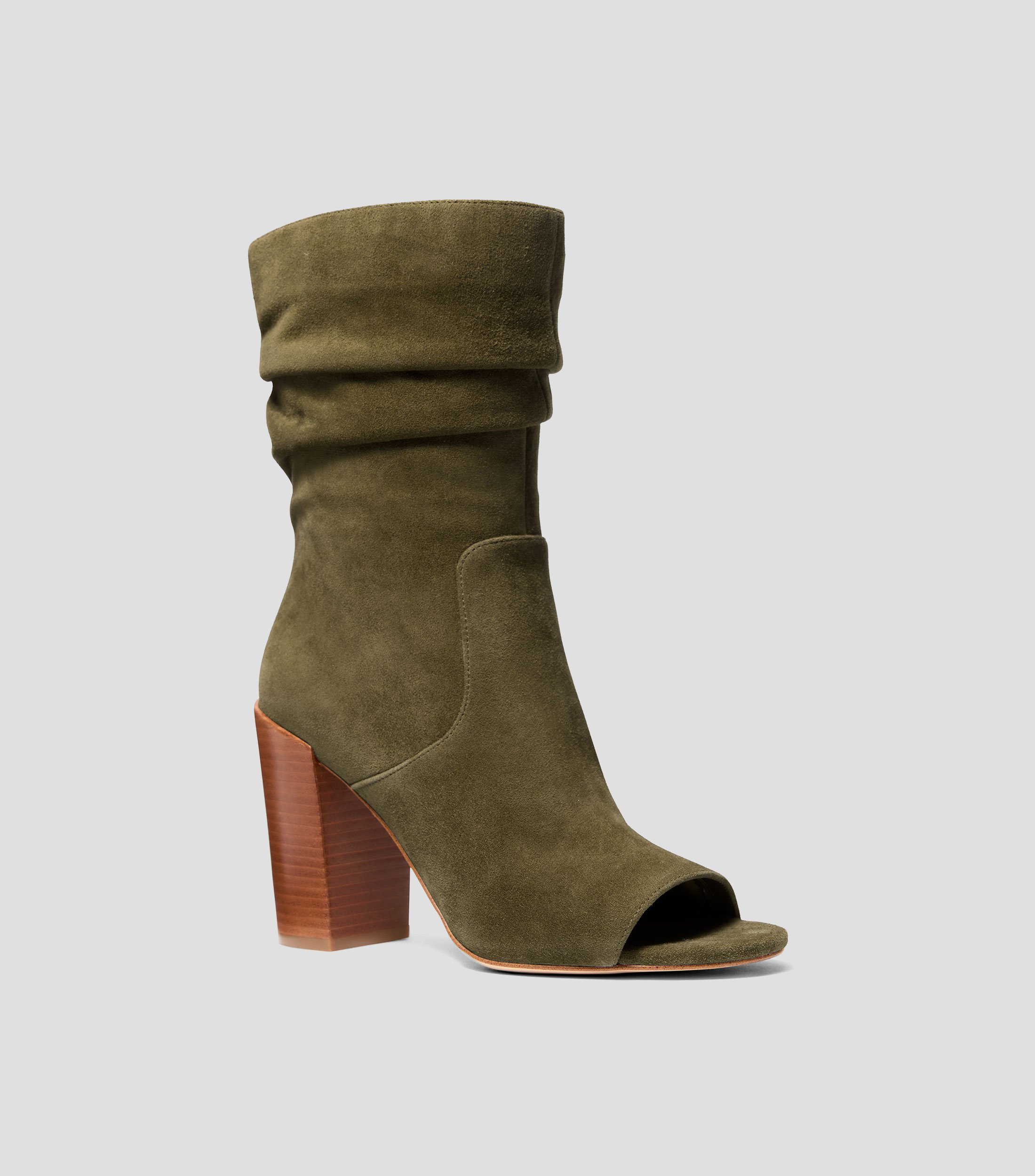 Botines en piel de tacón alto de media luna Mujer