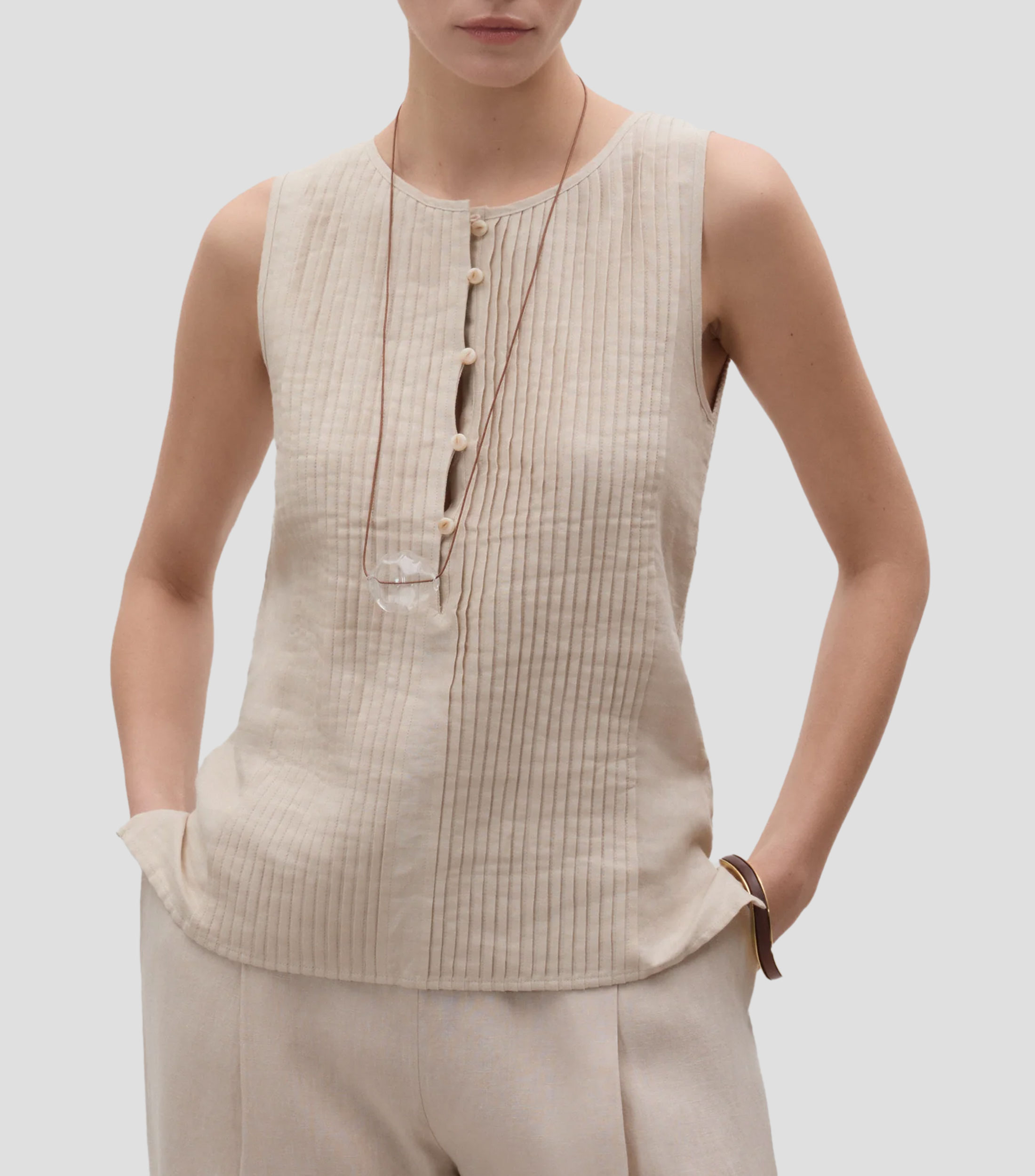 Blusa sin mangas con plisado Mujer
