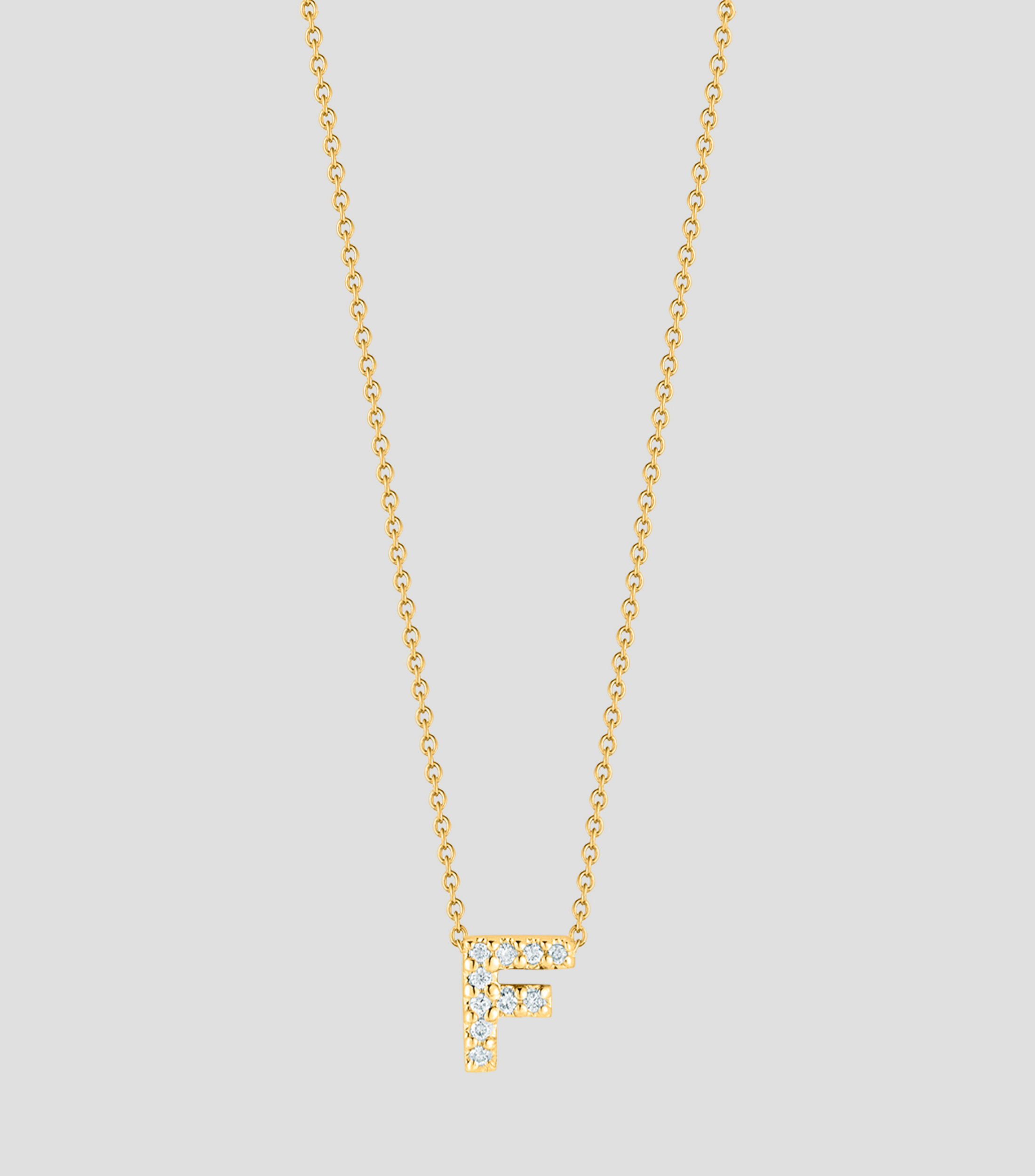 Collar en oro amarillo 18 Kilates letra F con diamantes Mujer