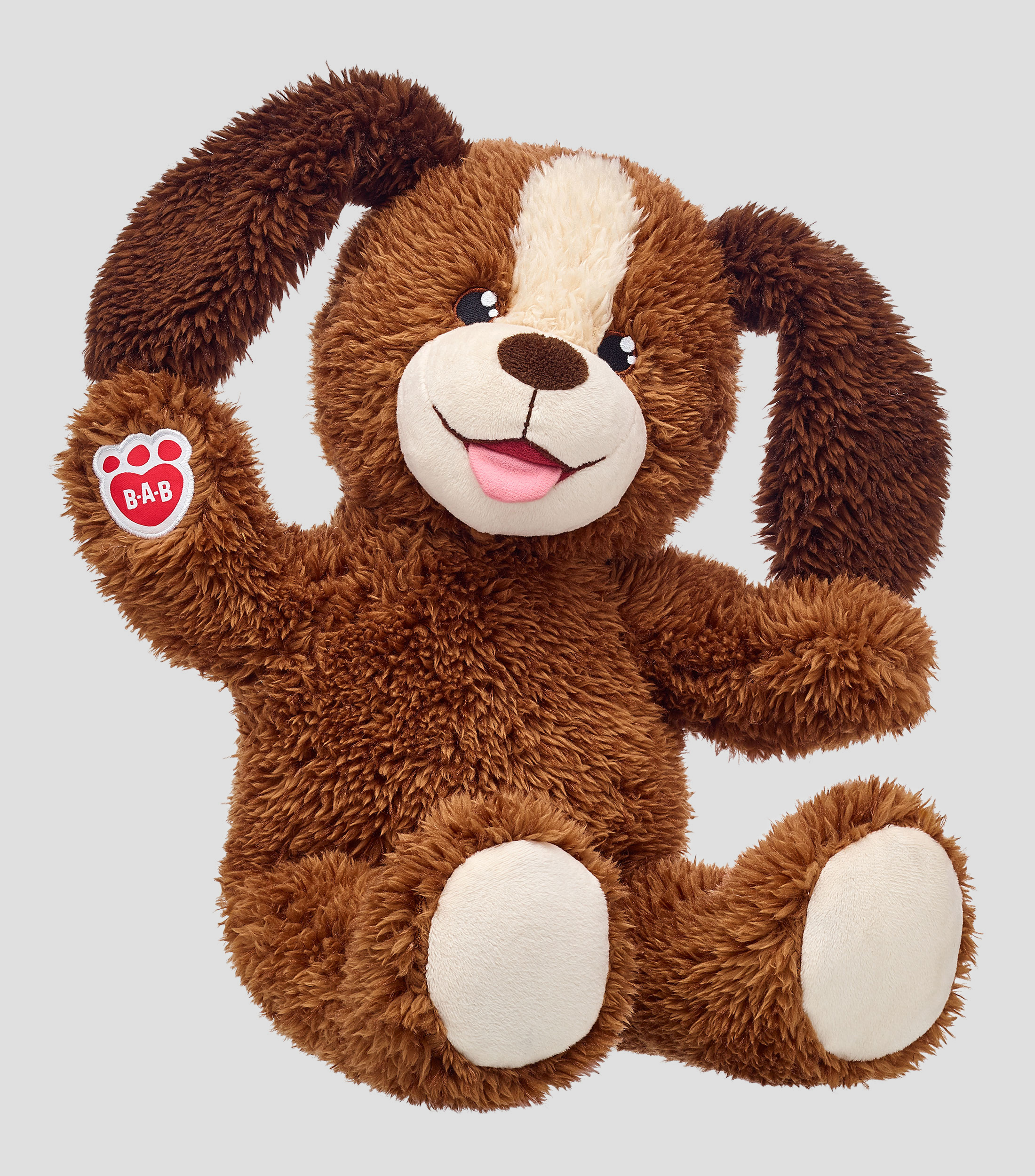 Perro cachorro de peluche