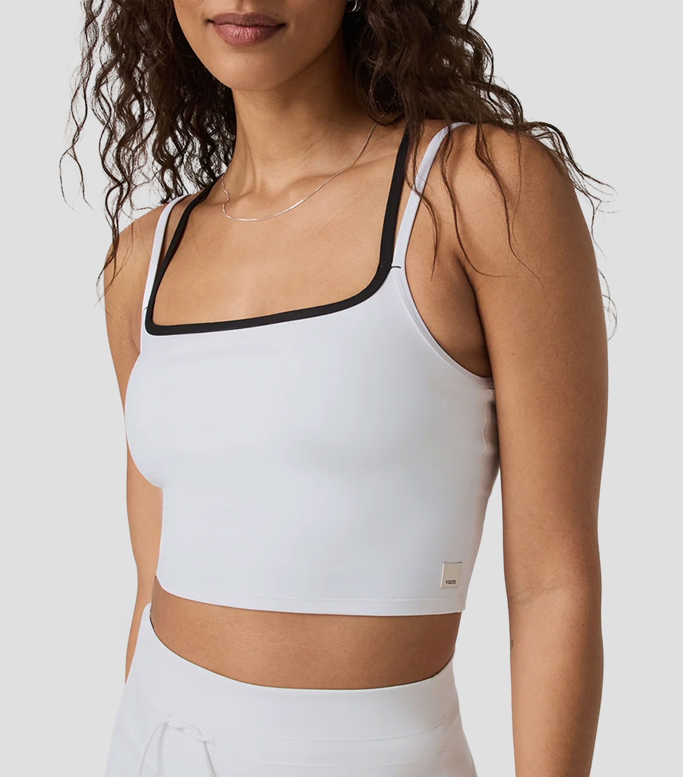 Playera cuello redondo sin mangas lisa Mujer