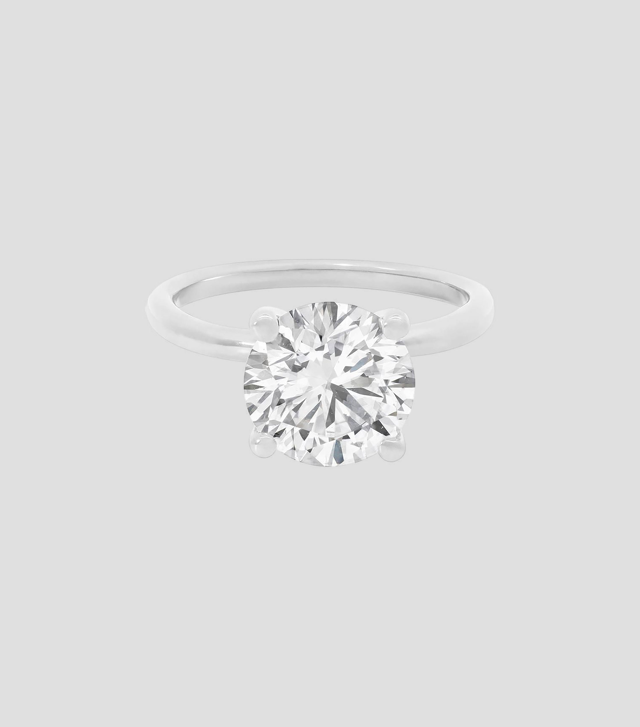 Anillo solitario en oro blanco 14 kilates con diamante Mujer