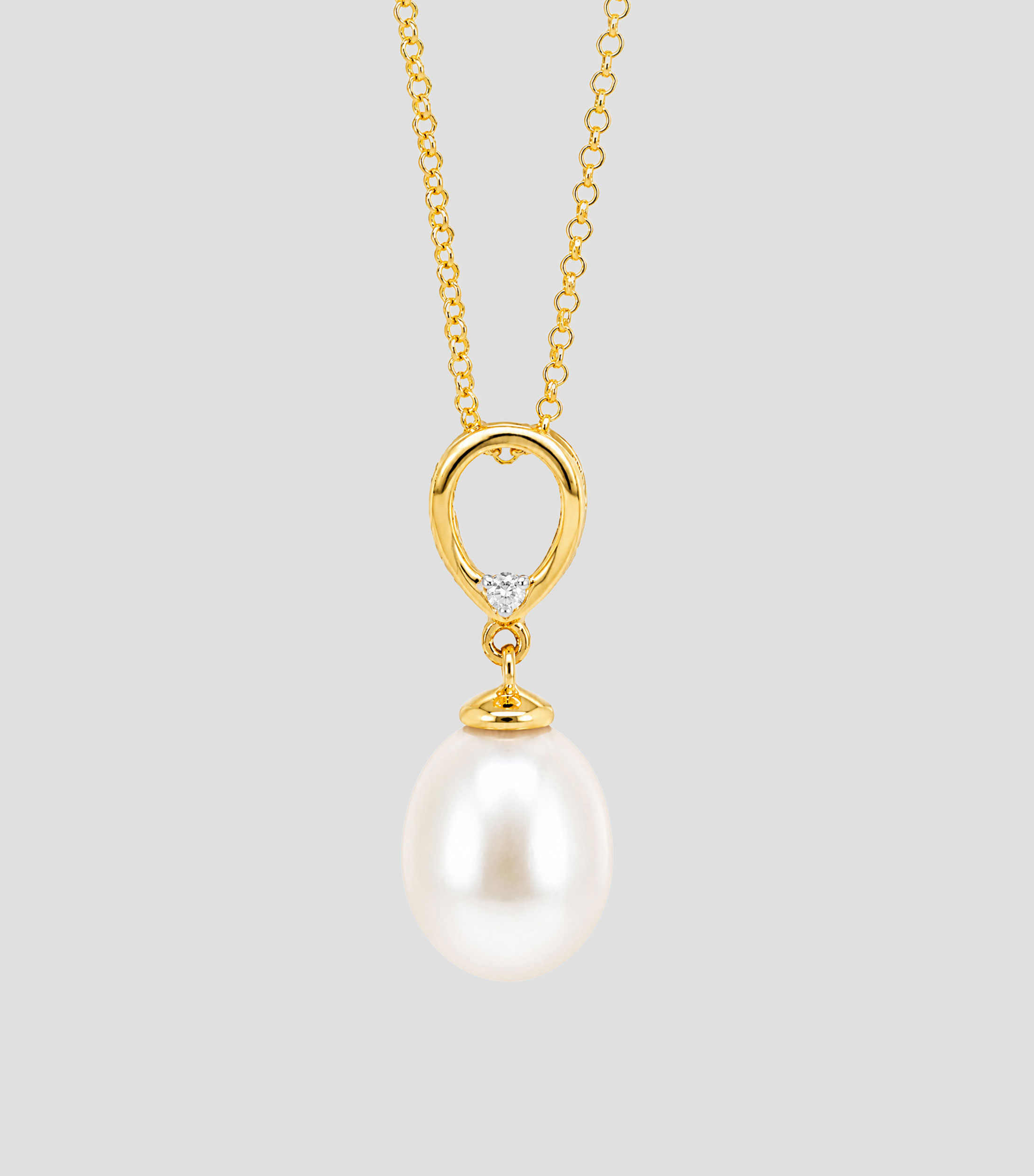 Dije con cadena en Oro de 14 Kilates Mujer