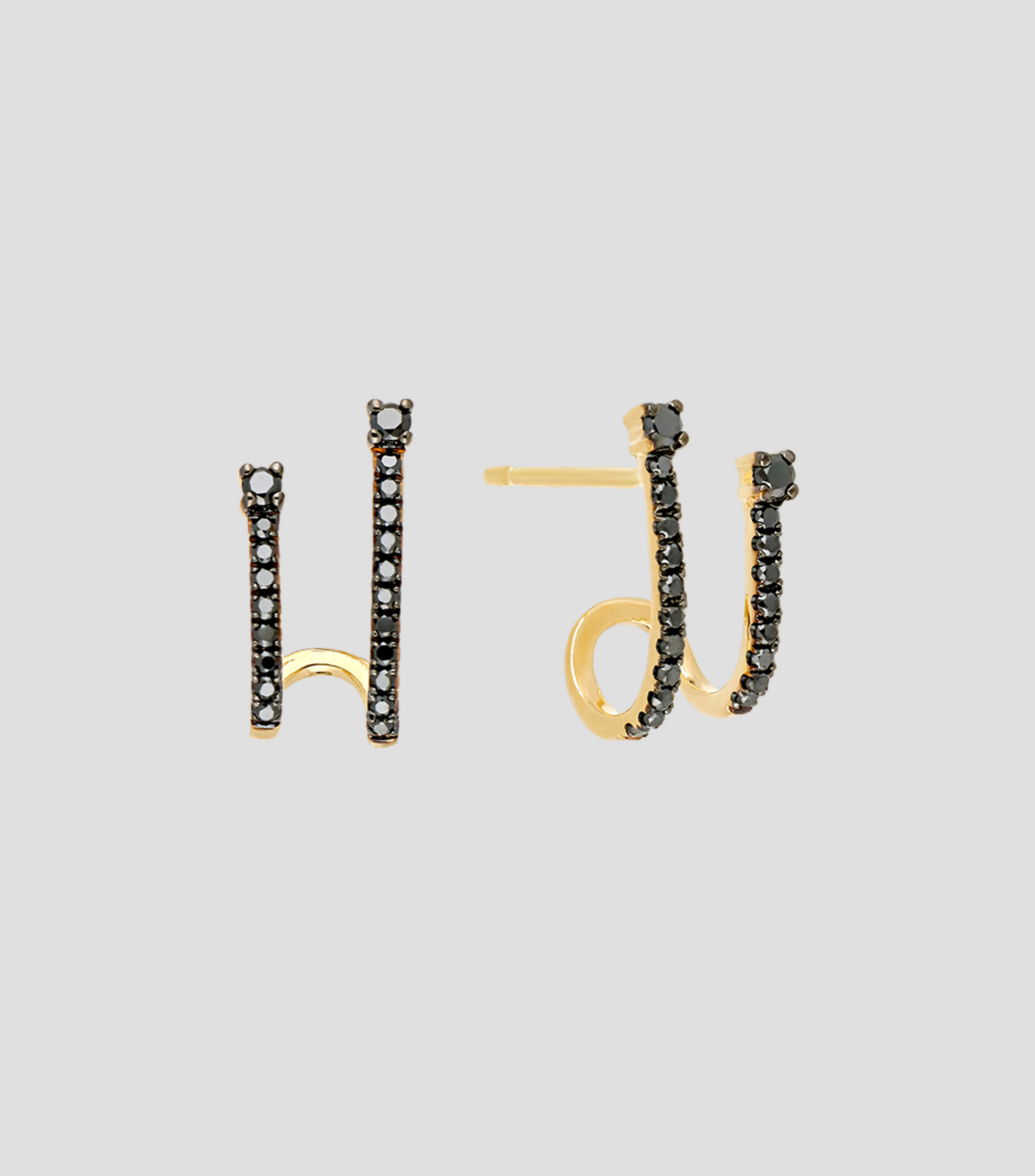 Aretes cuff de oro amarillo con diamantes negros Mujer