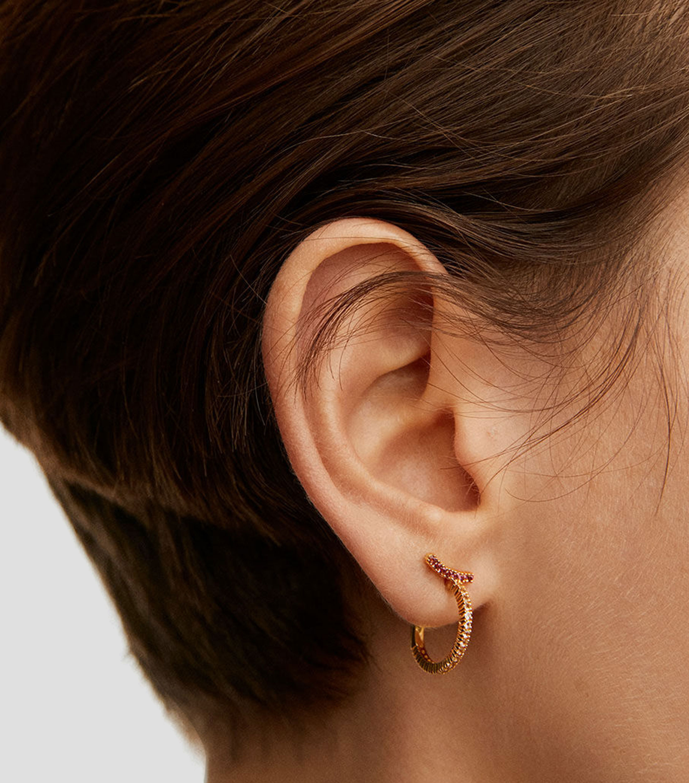 Aretes en plata con topacios blancos y rodolitas Crossbow Mujer