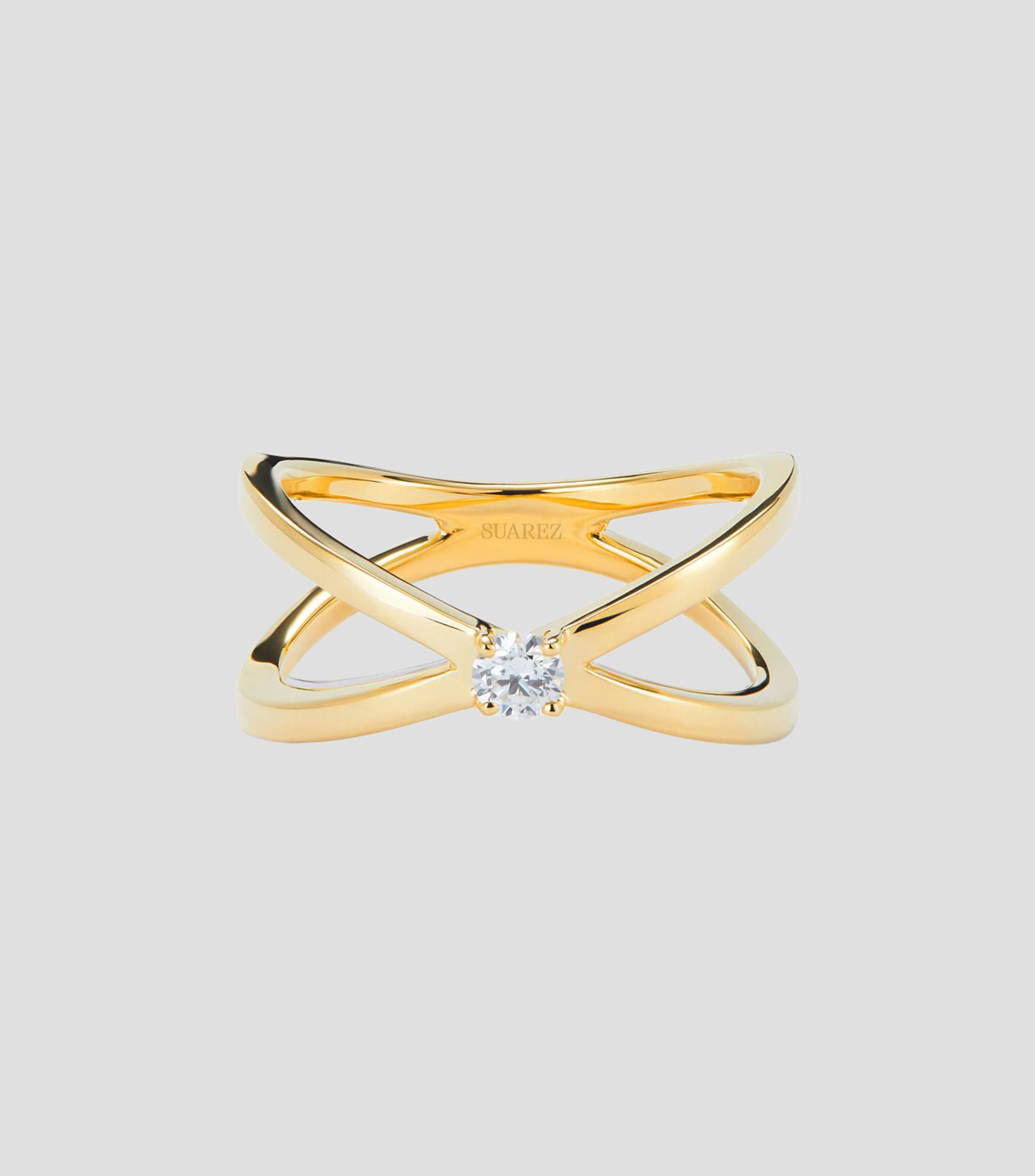 Anillo cruzado en Oro amarillo de 18 Kilates con diamante en talla brillante Mujer