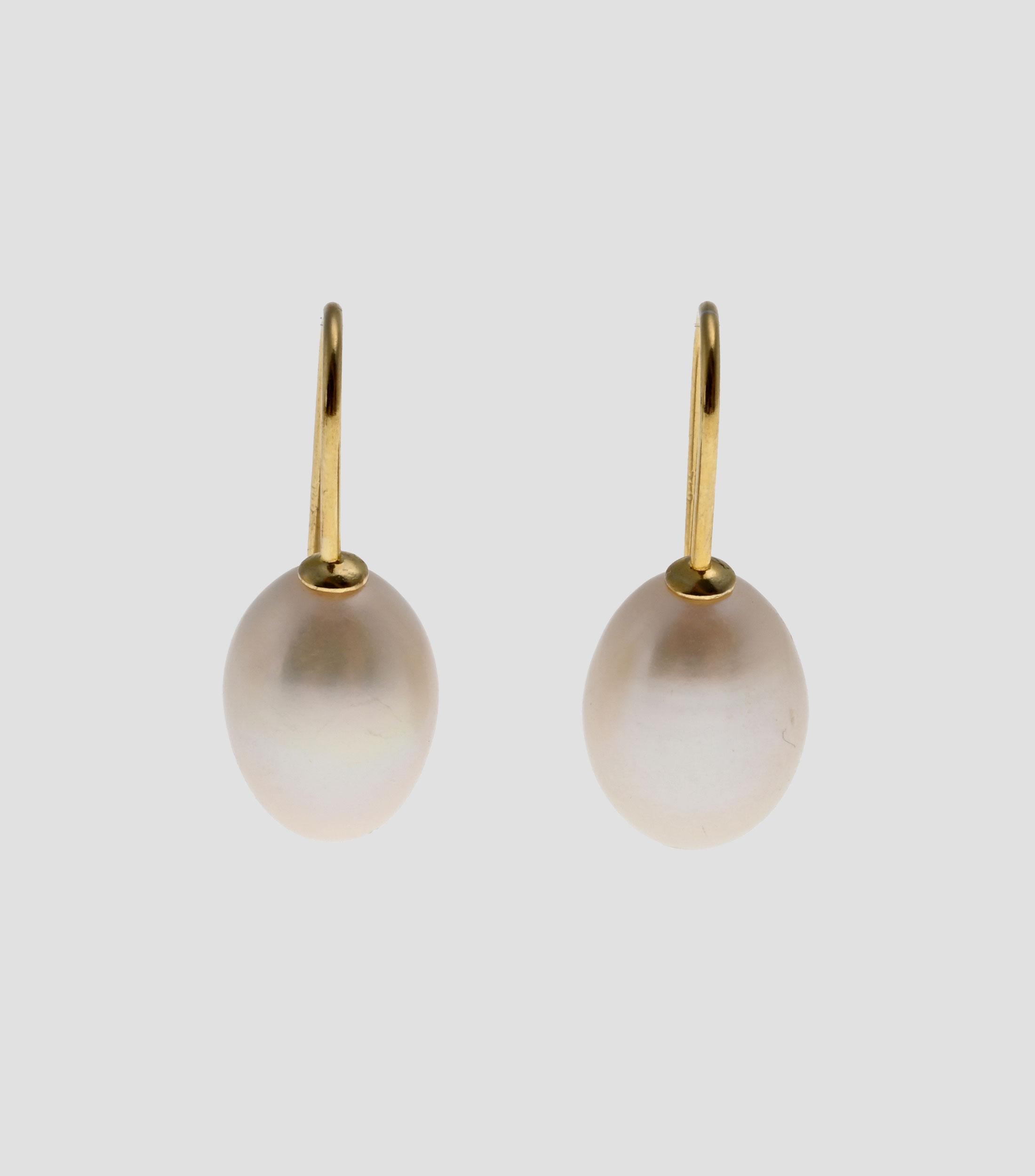 Aretes en forma ovalada Mujer