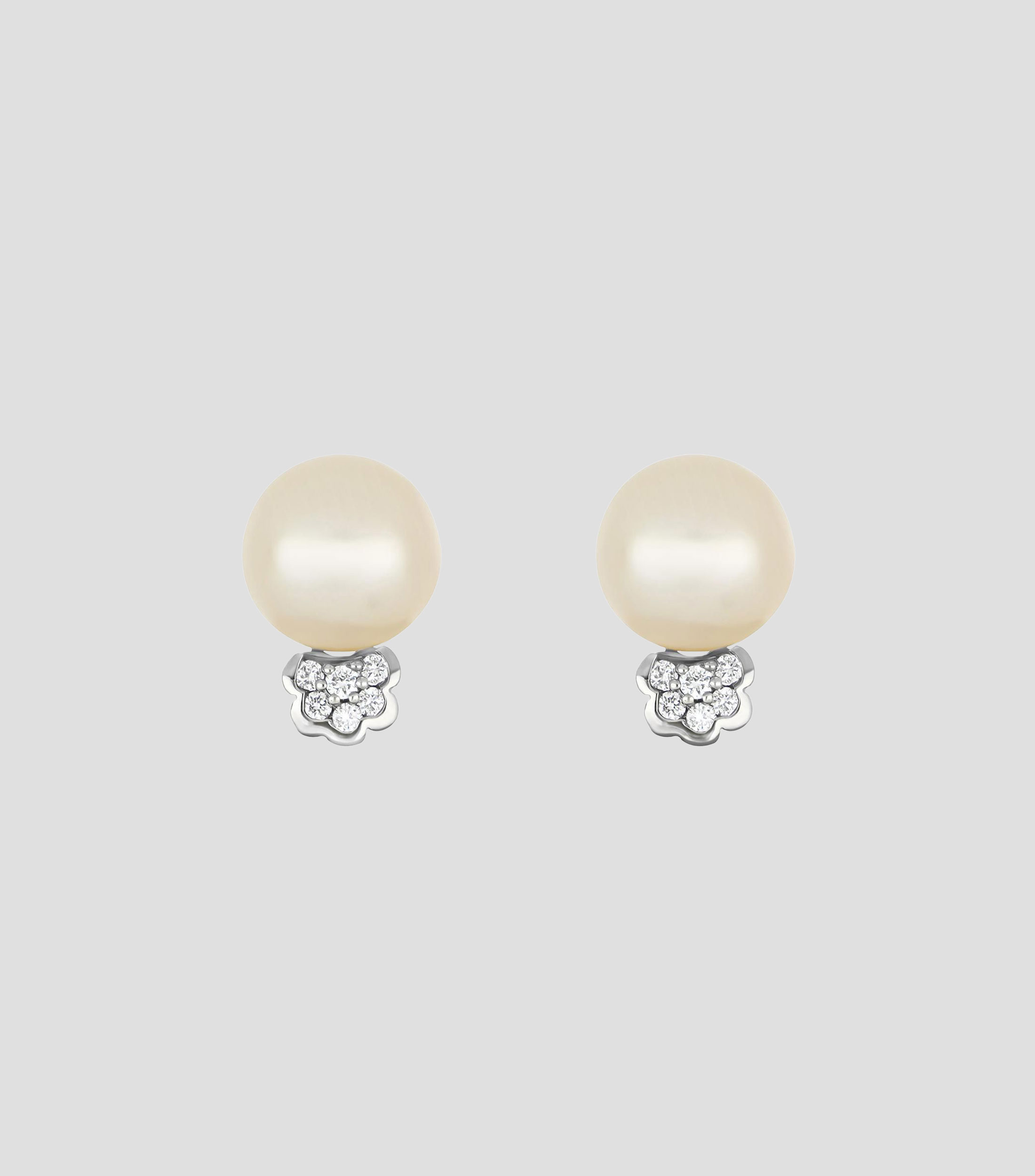 Aretes en oro blanco 14 kilates con perla y diamante Mujer