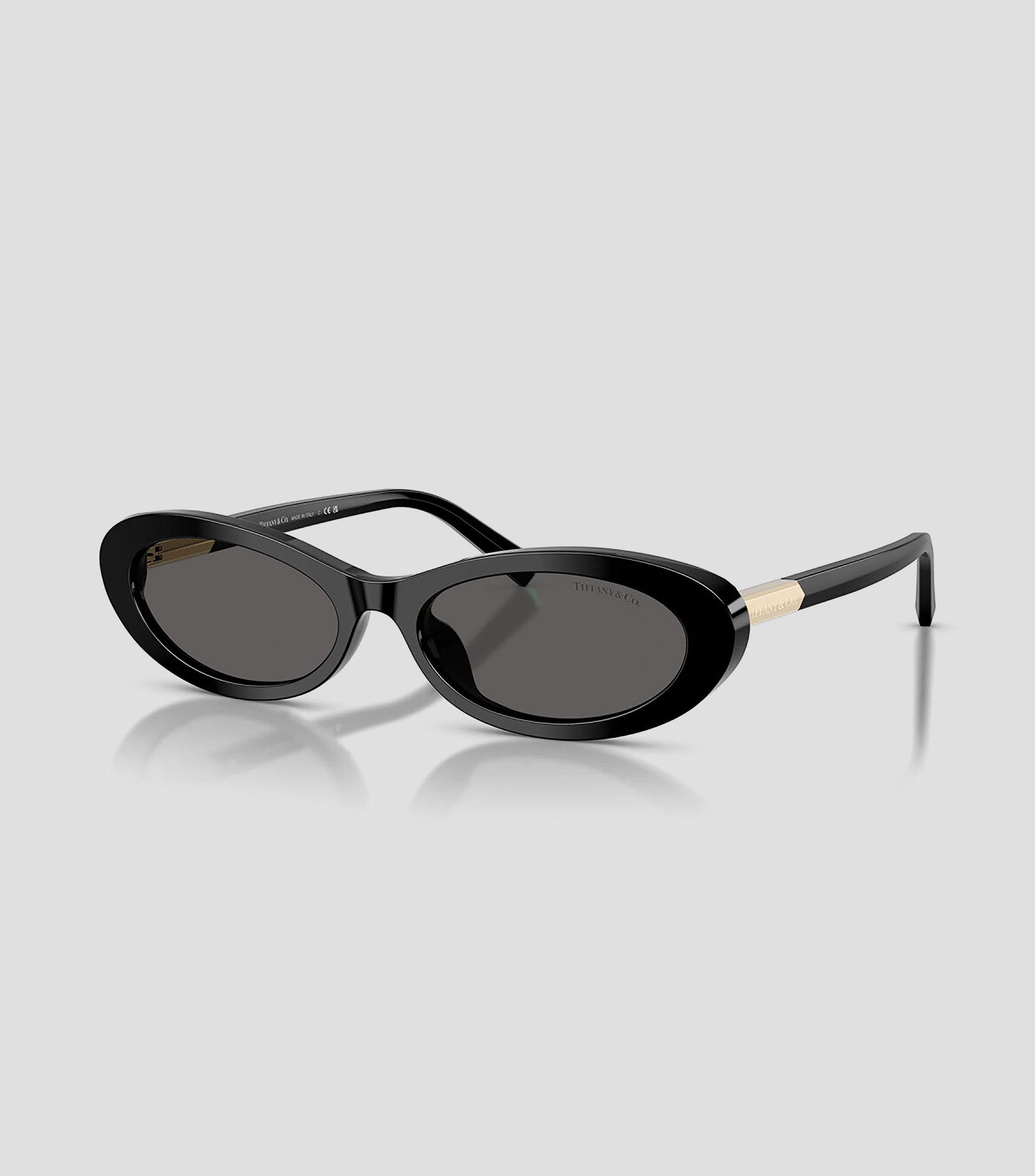 Lentes de sol ovalados negros Mujer