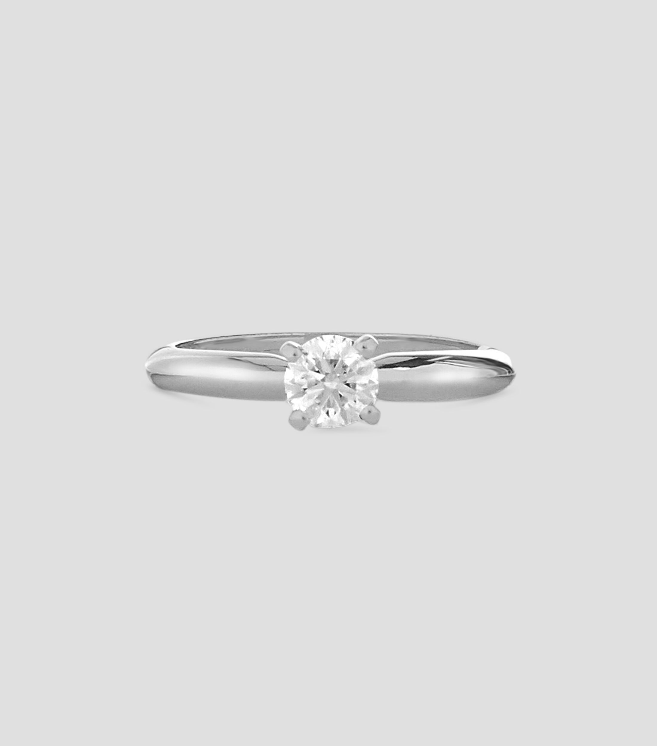 Anillo solitario en oro blanco 14 Kts con brillante Mujer