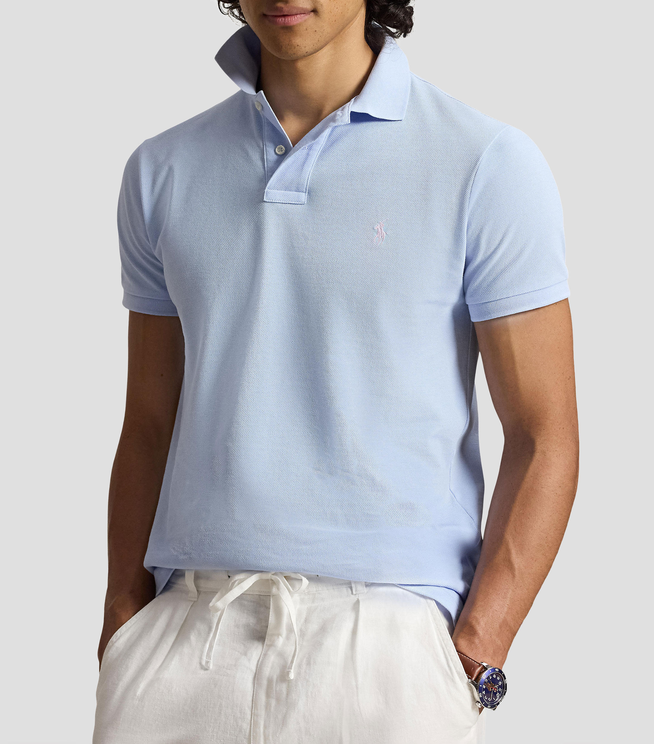 Playera tipo polo con manga corta lisa Hombre