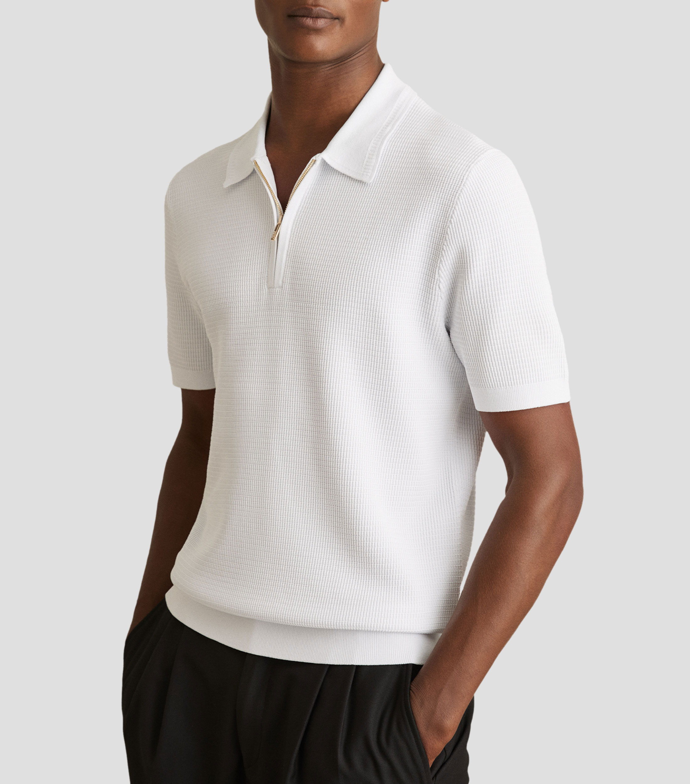 Playera tipo polo con manga corta lisa Hombre