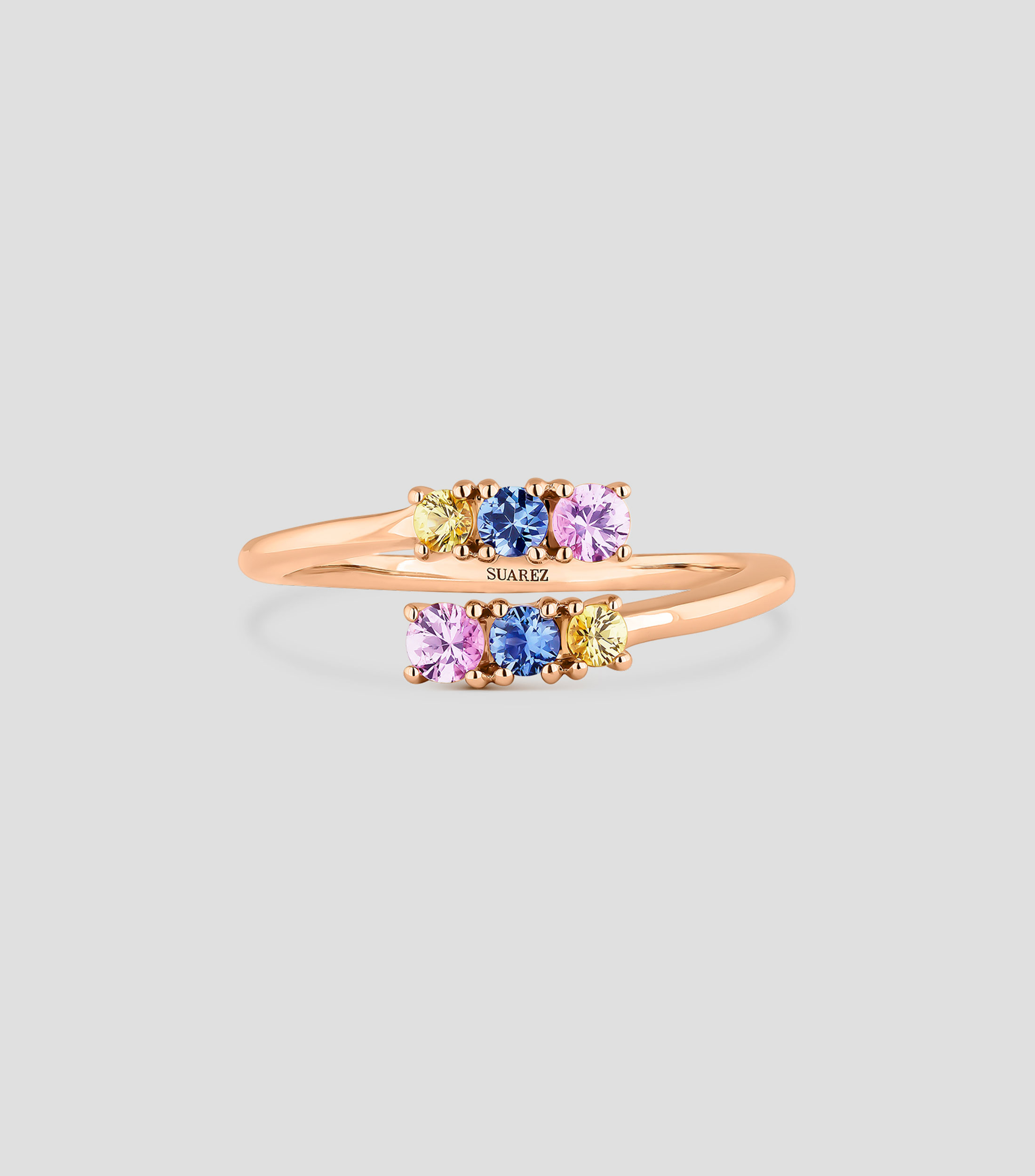 Anillo en oro rosa de 18 Kts con zafiros Mujer
