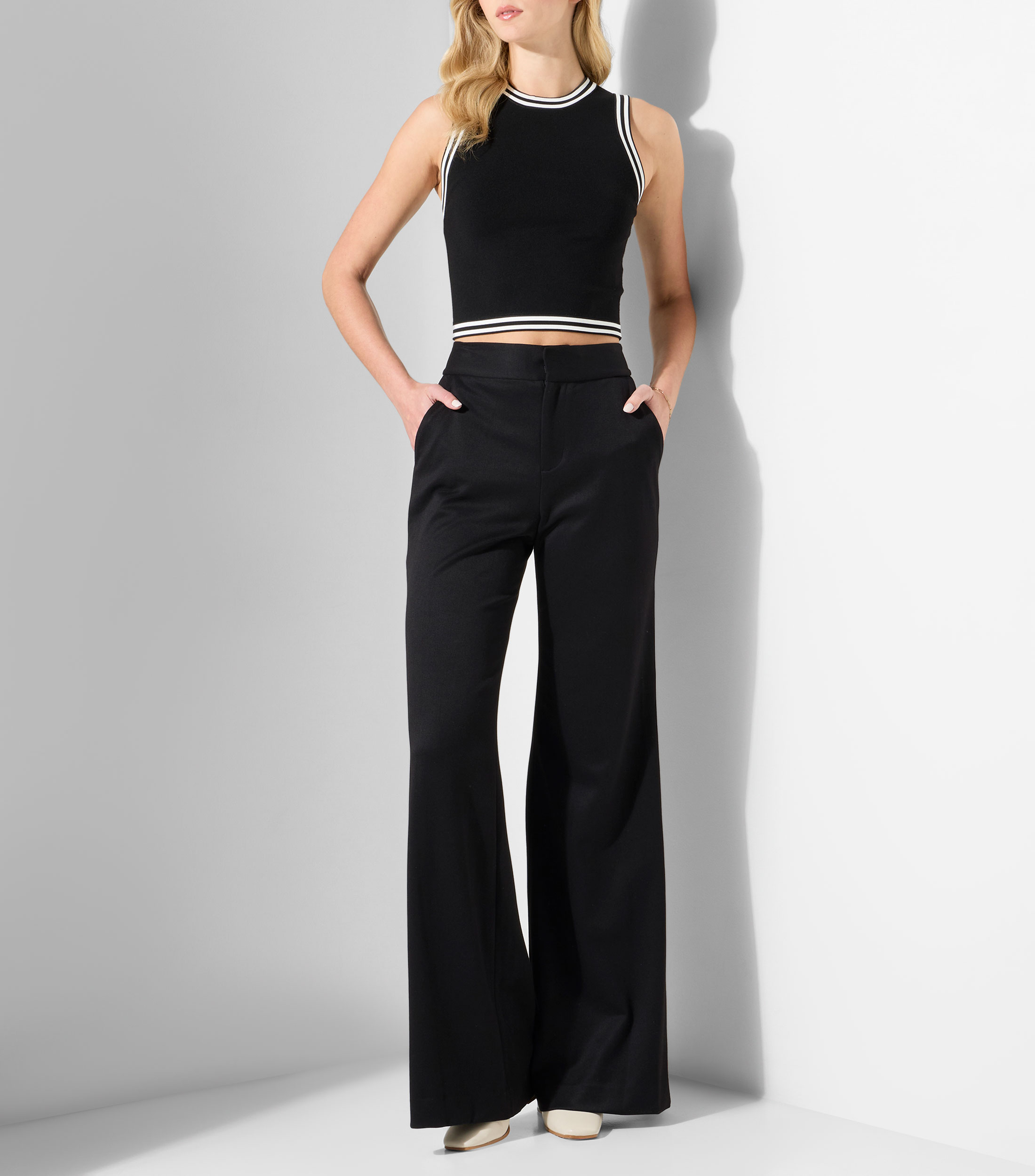 Blusa lisa sin mangas Mujer