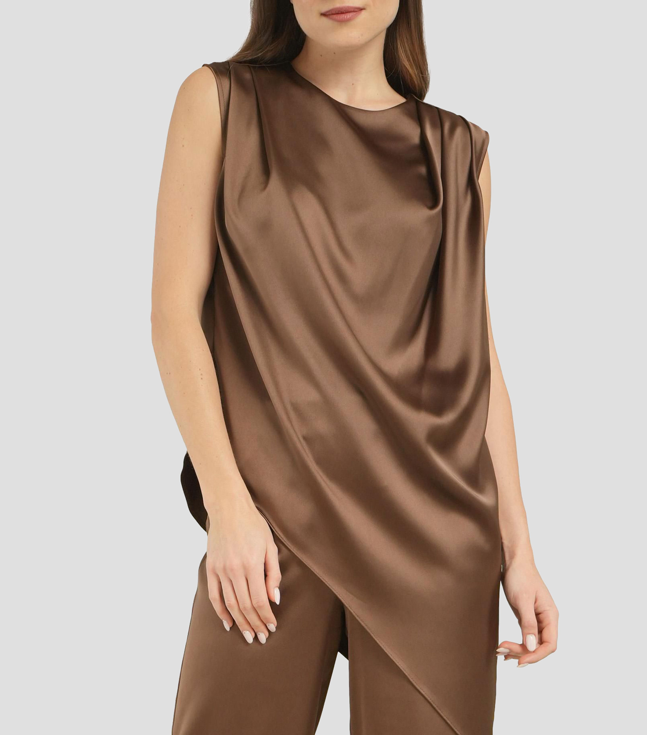 Blusa lisa sin mangas Mujer