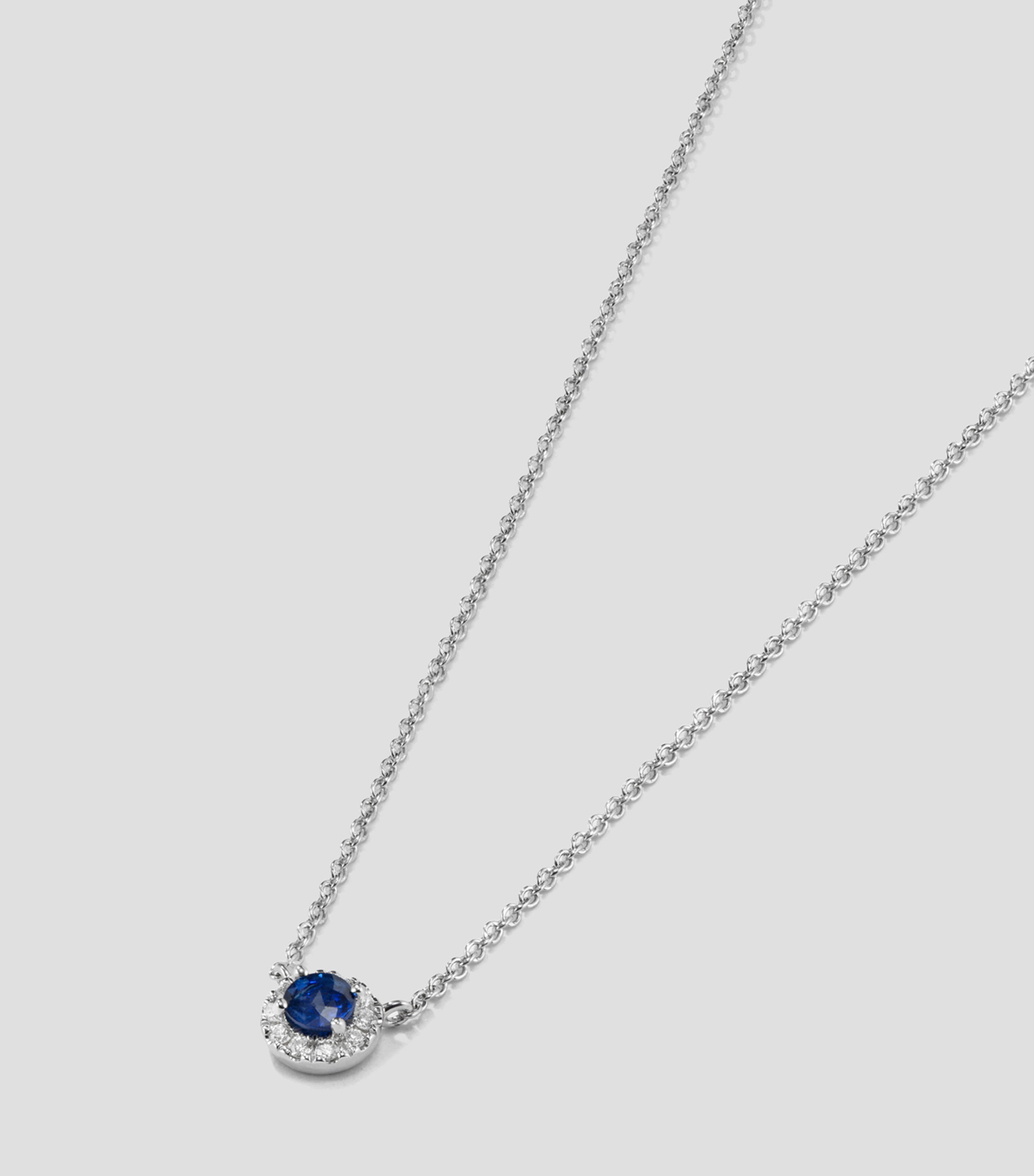 Collar en Oro blanco de 18 Kilates con zafiro azul y diamante Mujer