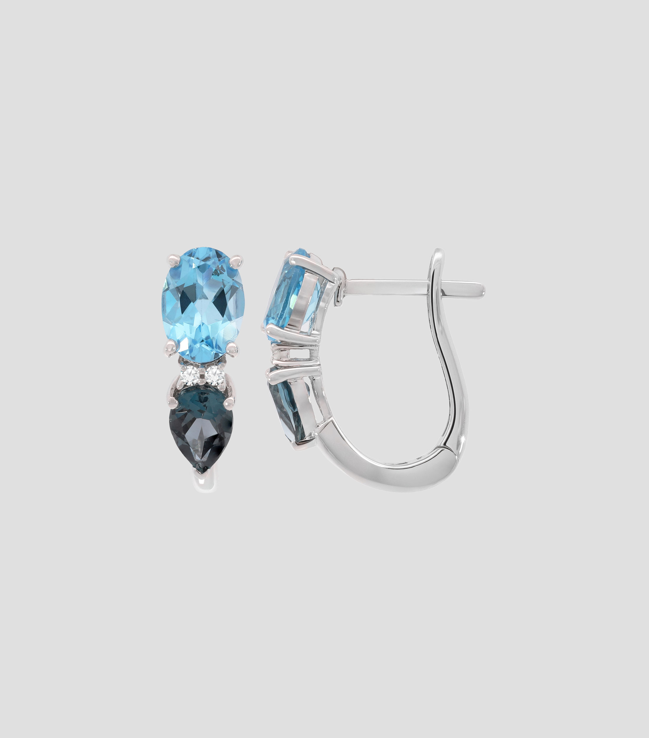Aretes en oro blanco de 14 kilates con topacios y diamantes Mujer