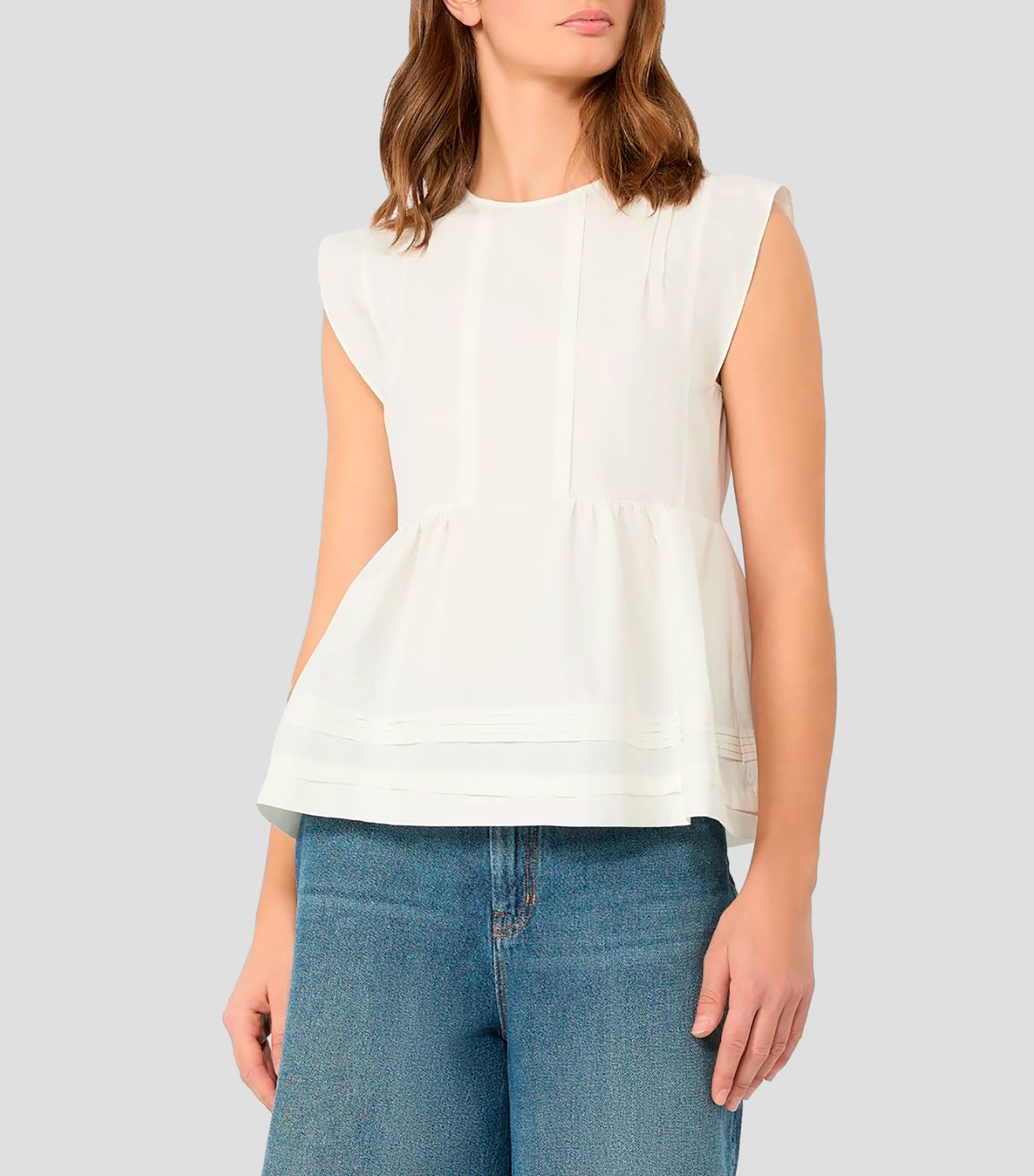 Blusa lisa sin mangas Mujer