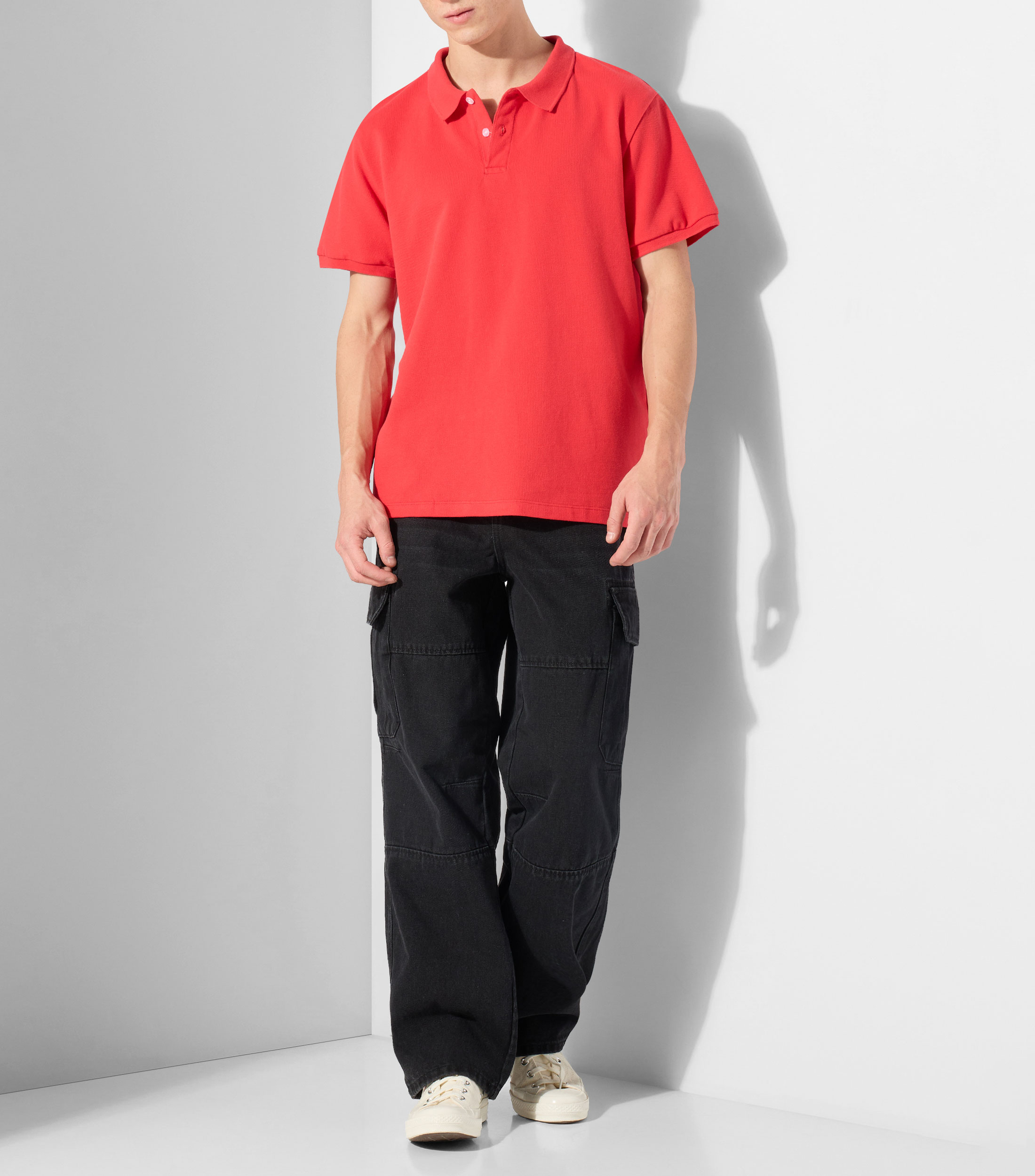 Playera tipo polo con manga corta lisa Hombre