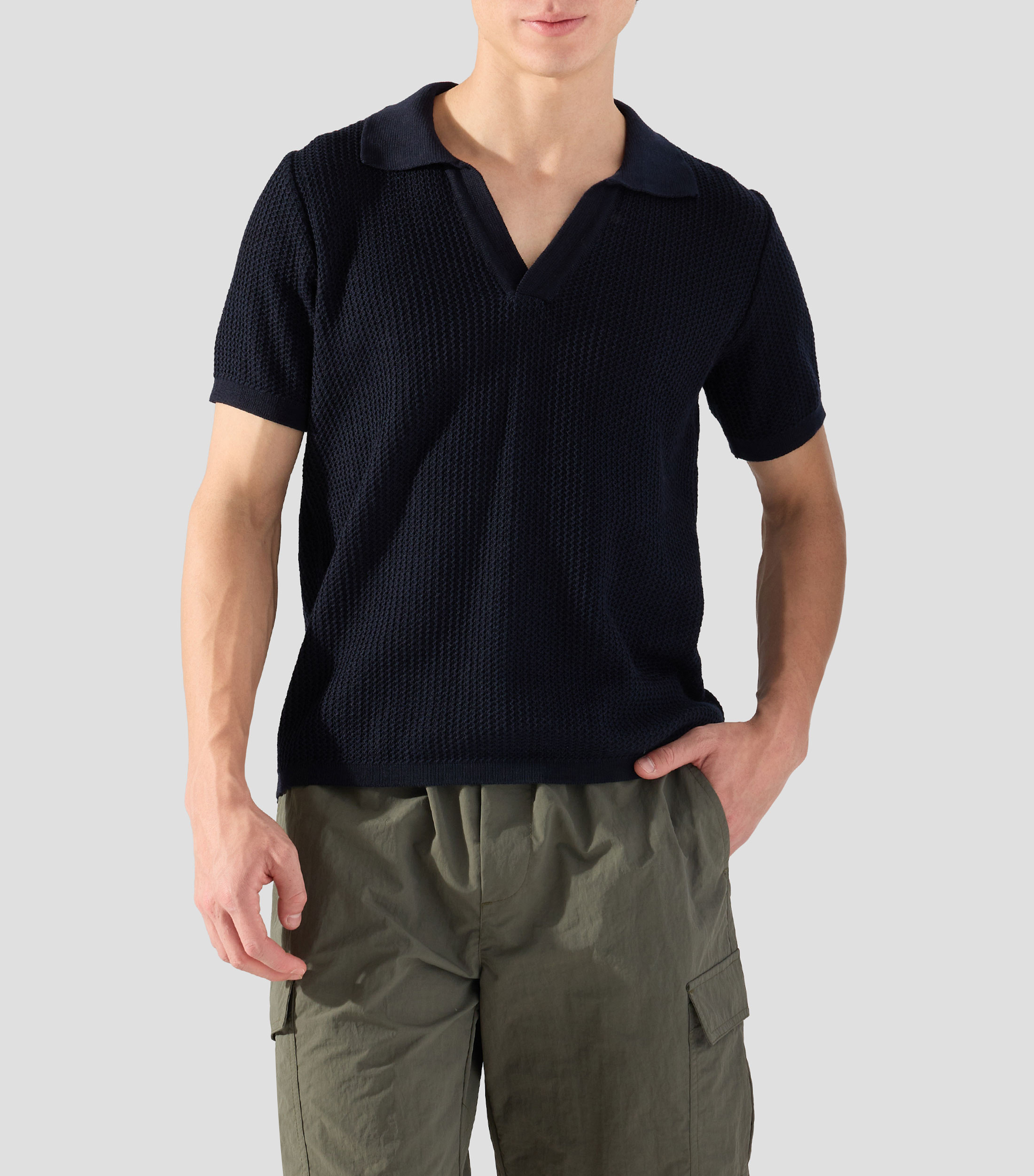 Playera tipo polo con manga corta lisa Hombre