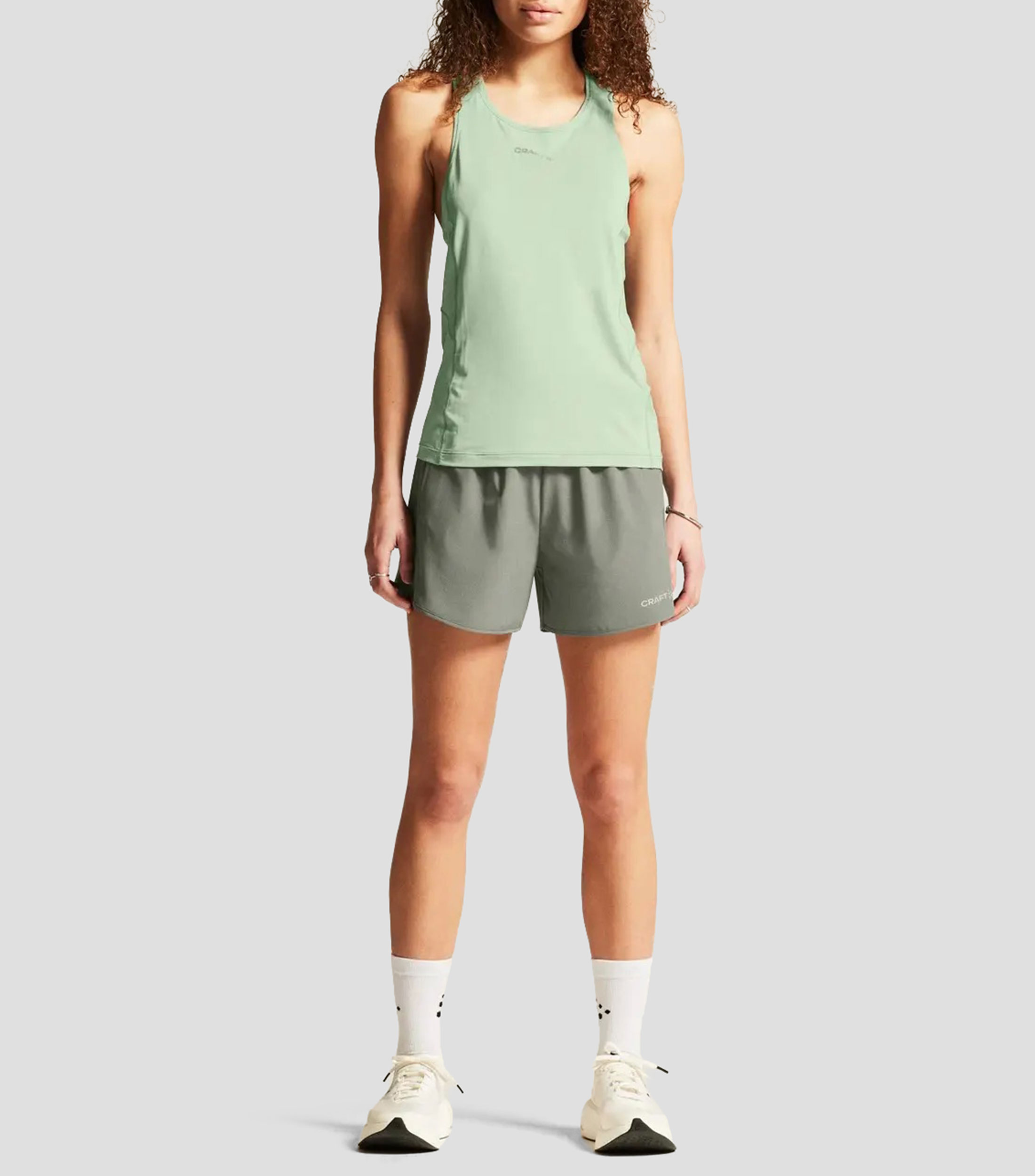 Playera para entrenamiento cuello redondo sin mangas lisa Mujer