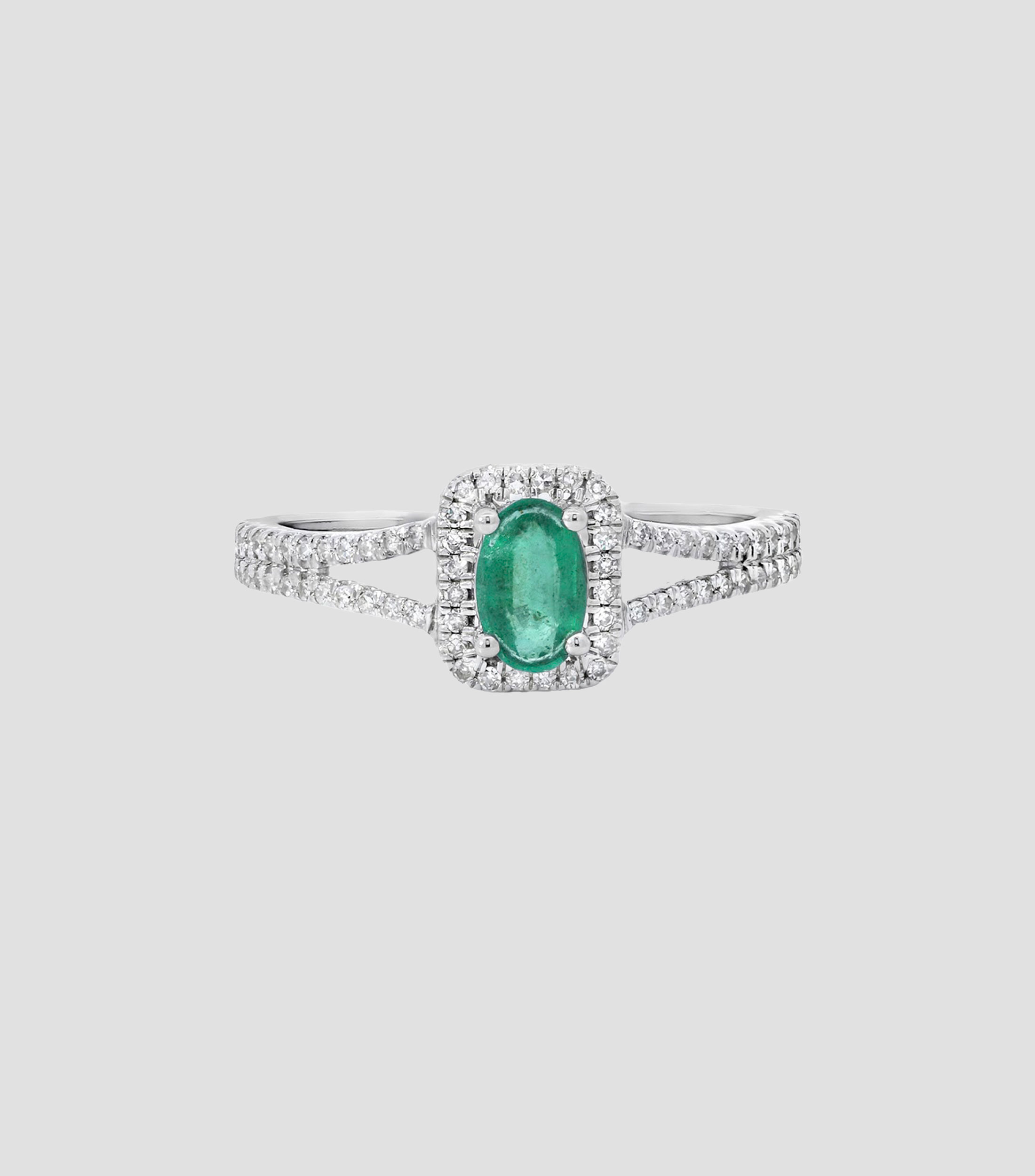 Anillo en Oro blanco de 14 Kilates con esmeralda Mujer