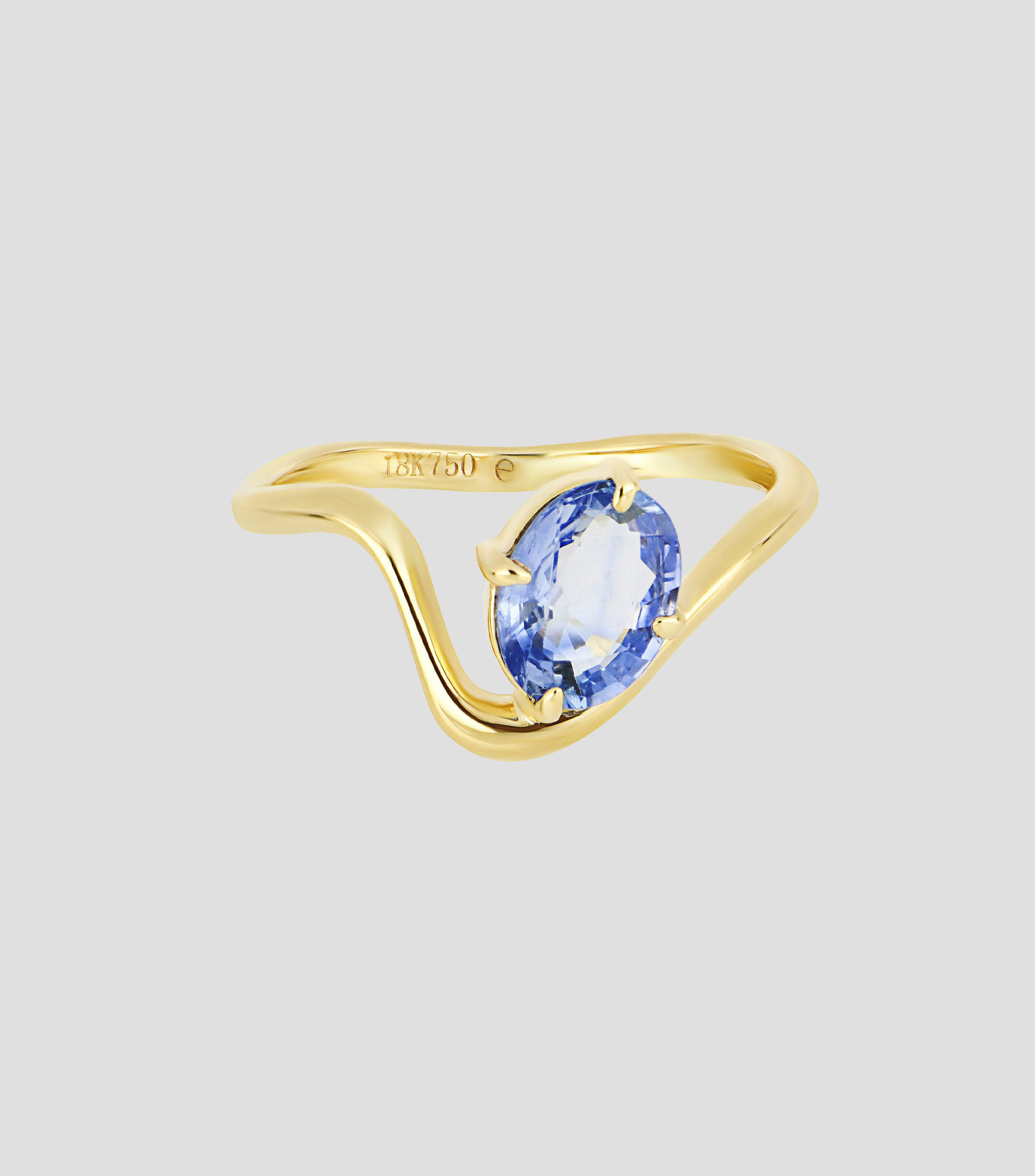 Anillo en Oro amarillo de 18 Kilates con zafiro Mujer