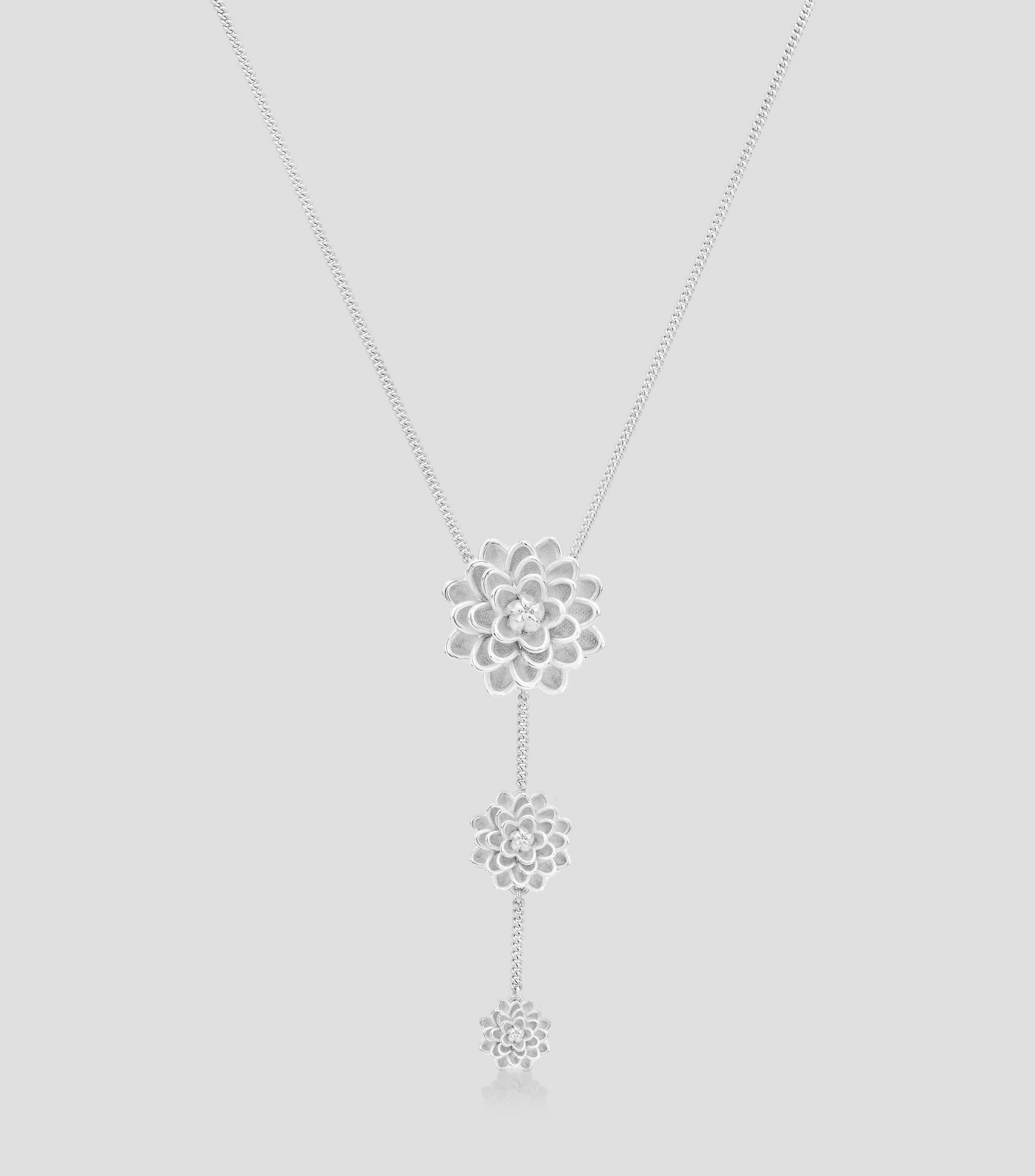Dije en plata Flores Mujer