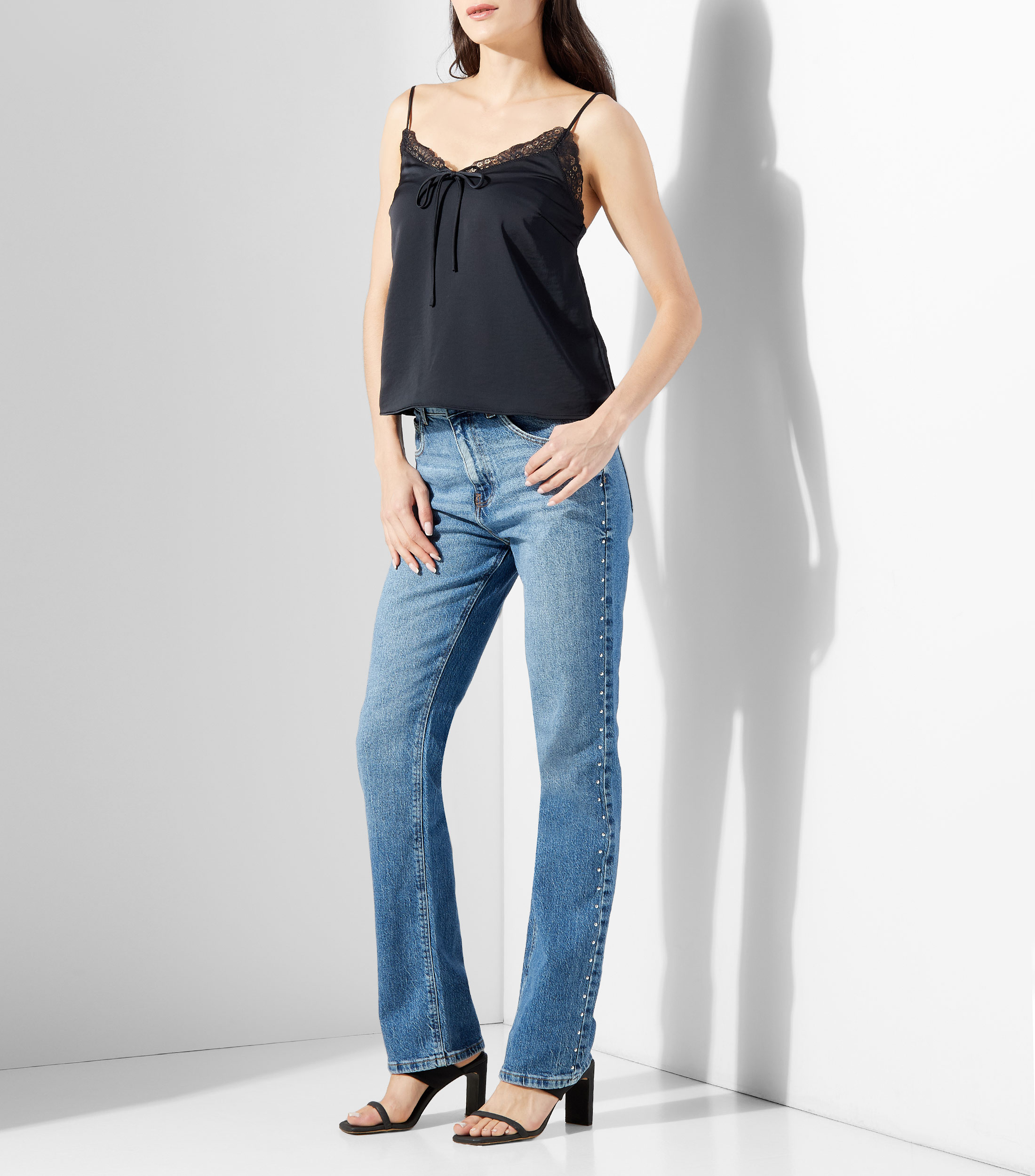 Blusa lisa sin mangas Mujer