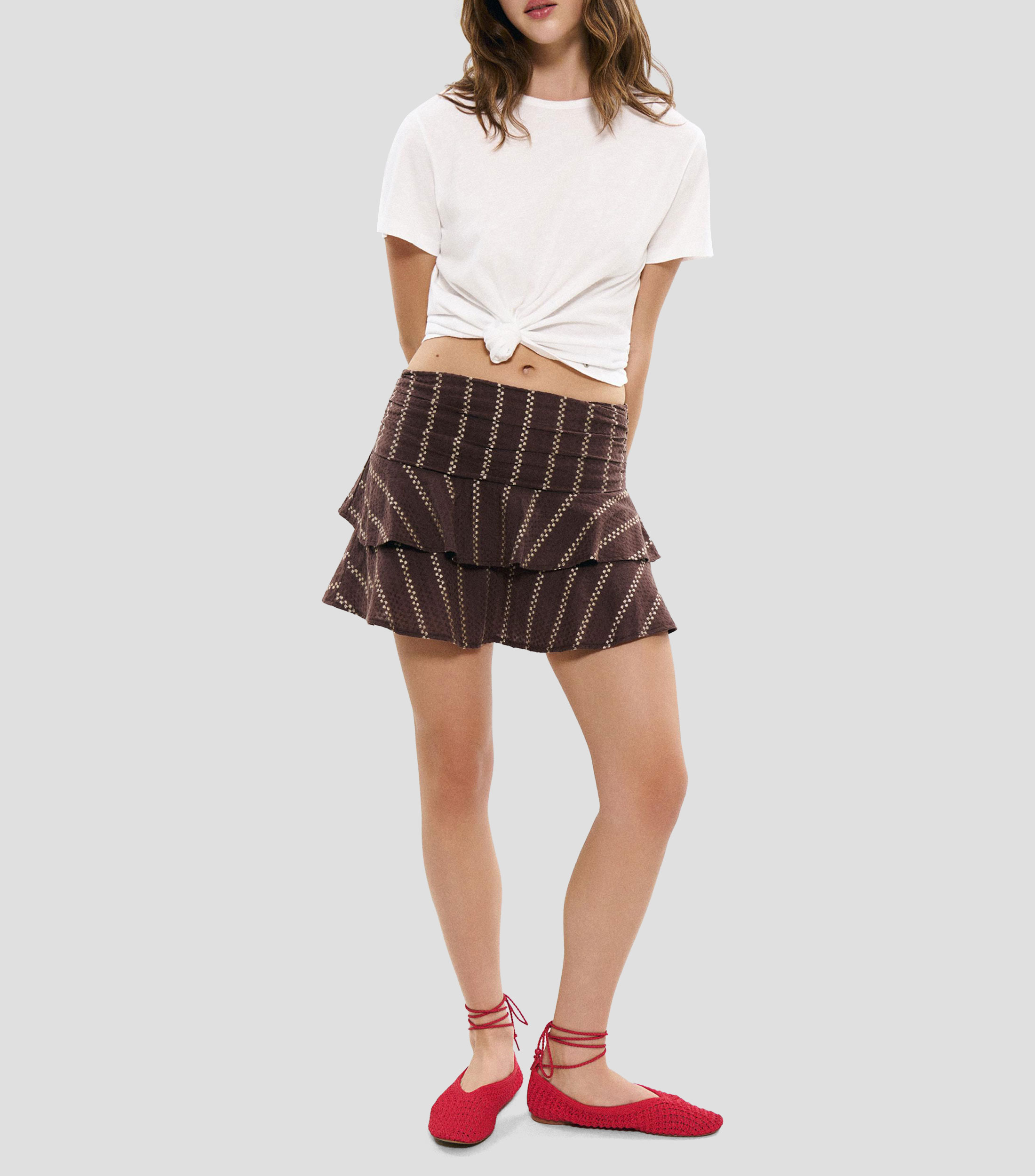 Falda corta de corte recto fantasía Mujer