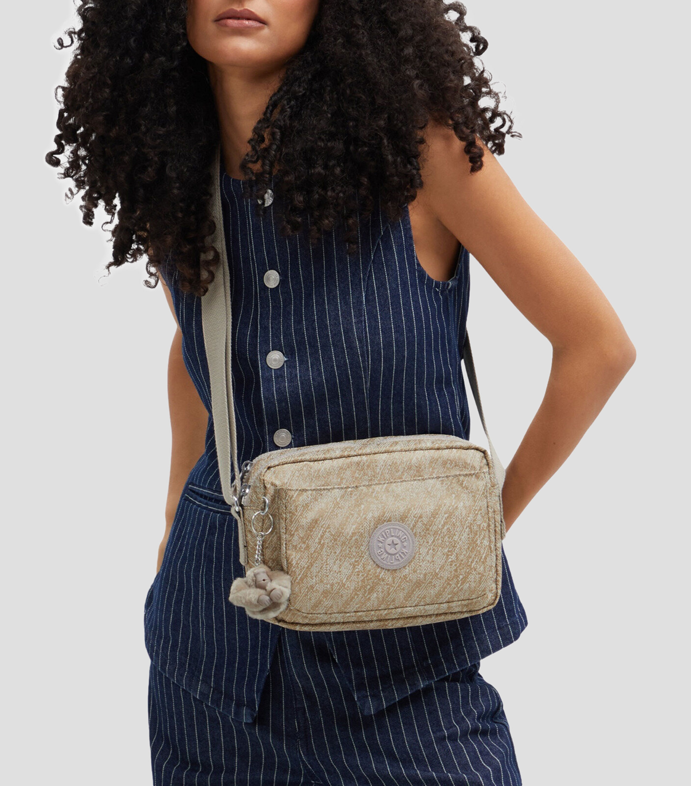 Bolsa crossbody dorado Abanu estampada Mujer