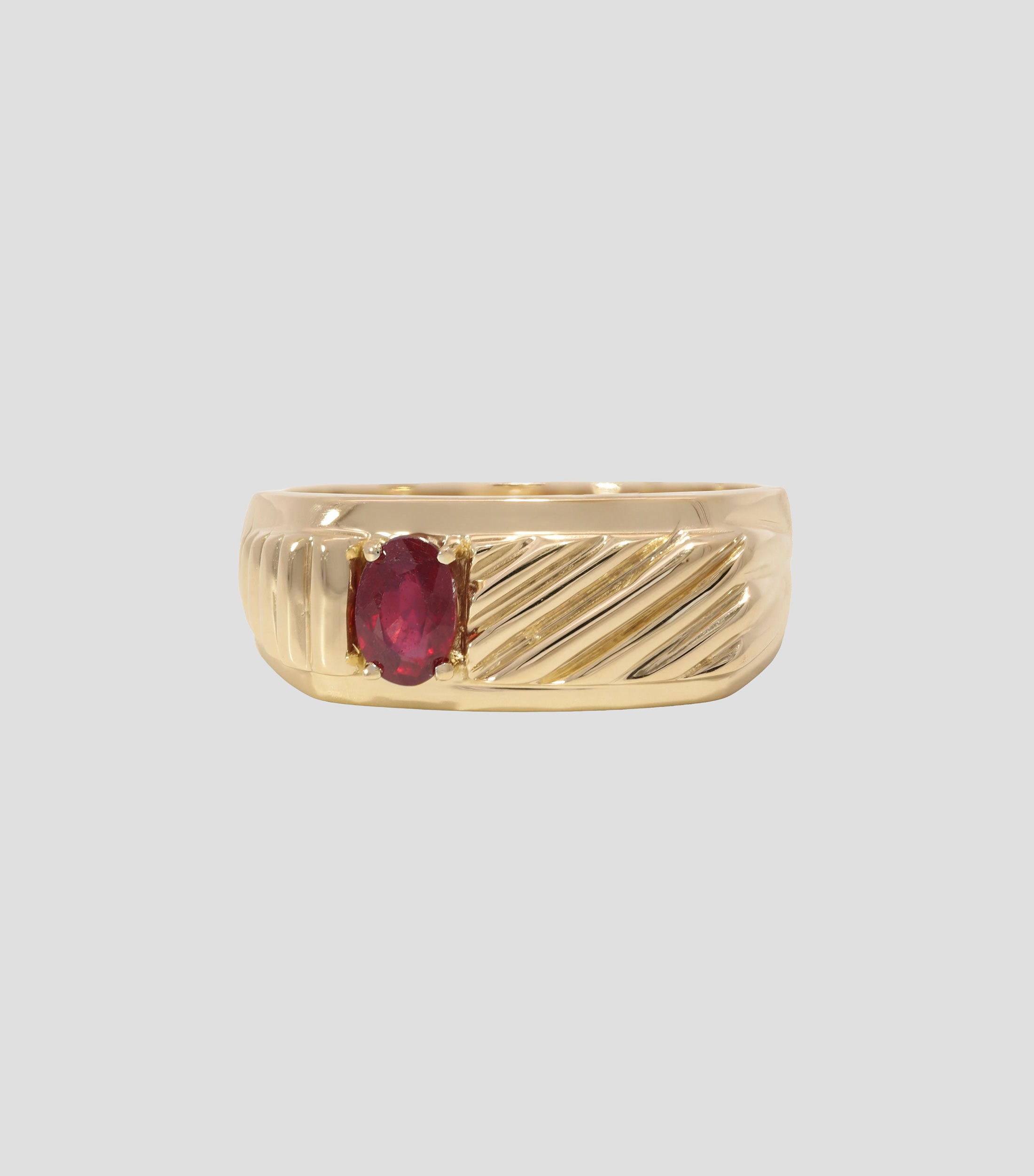 Anillo en oro amarillo de 14 kilates con rubí Hombre