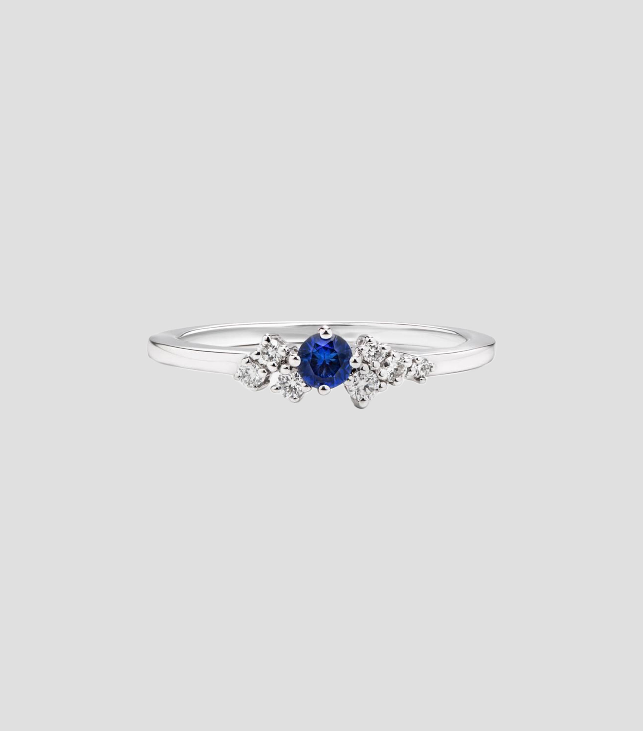Anillo solitario en oro blanco 18 Kilates con diamantes y zafiro Mujer