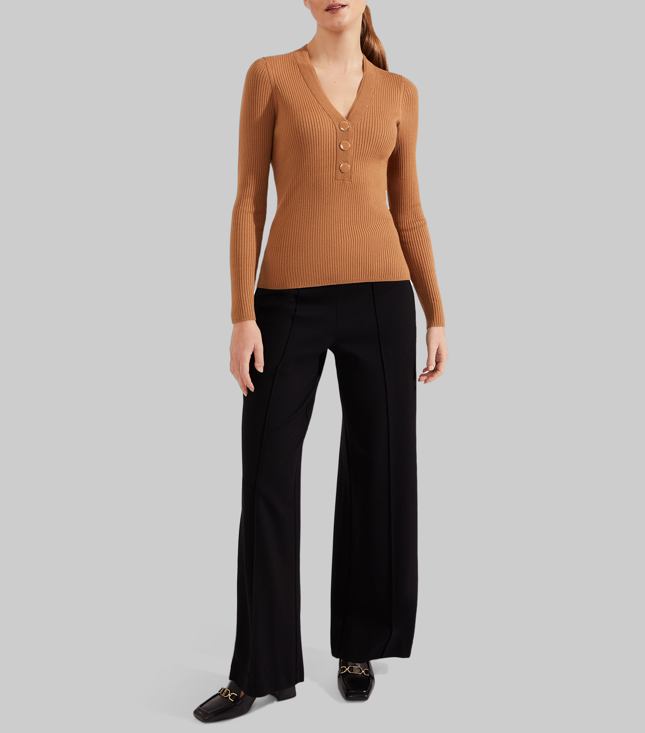 Suéter cuello V Mujer