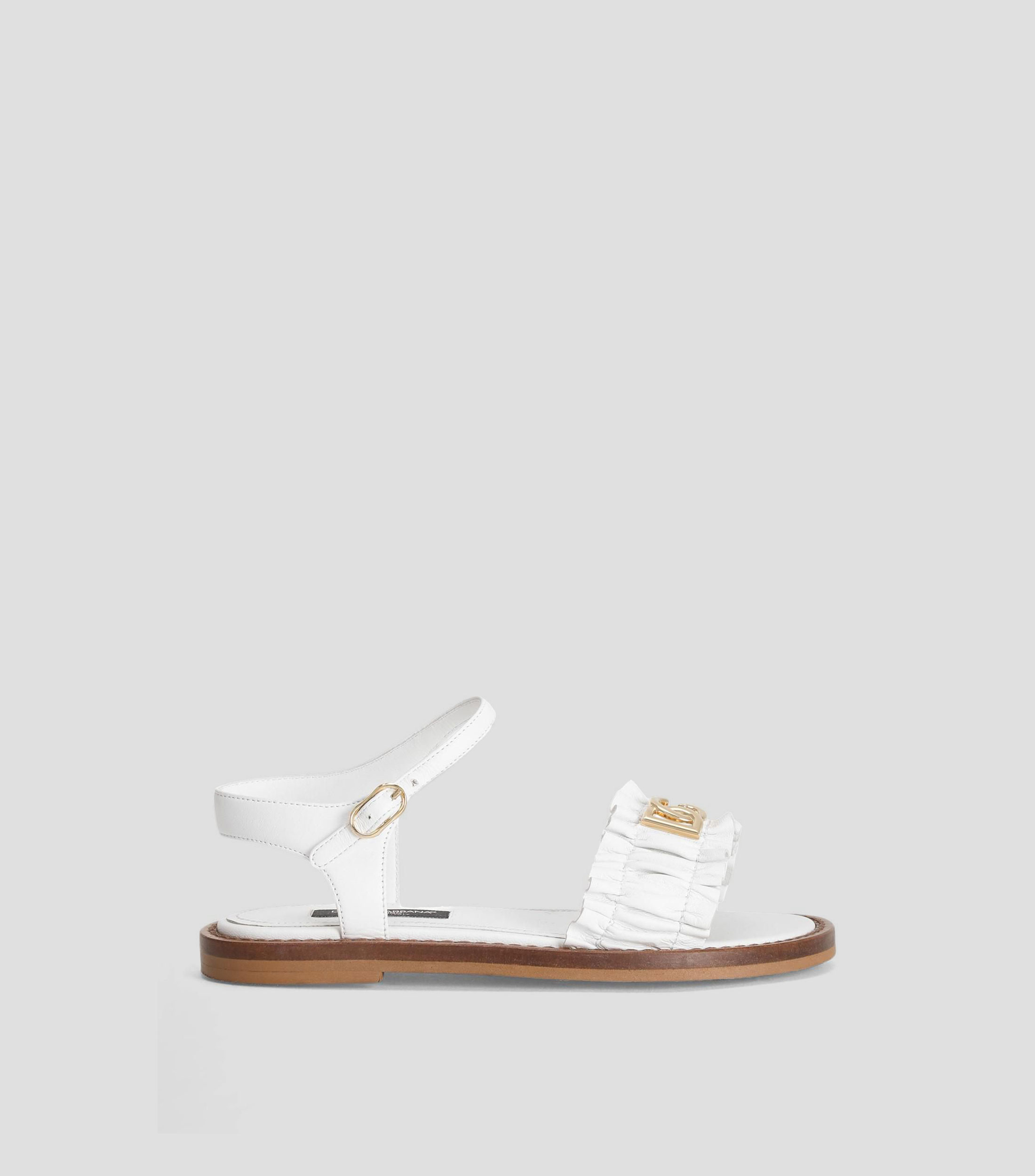 Sandalias planas en piel Niña